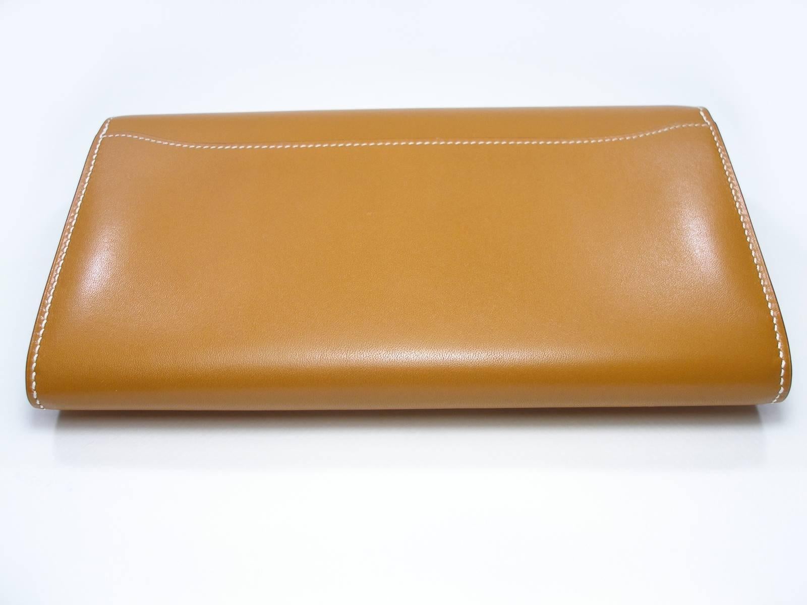 Stunning Constance Clutch Hermés
Leather : veau buttler
Color : naturel
Plastic covered on all hardware
Condition : Never used
Dimensions : 20.5 x 11.5 x 3 cm
Please note for this purchase  : this wallet Constance comes Hermès Private sale reserved