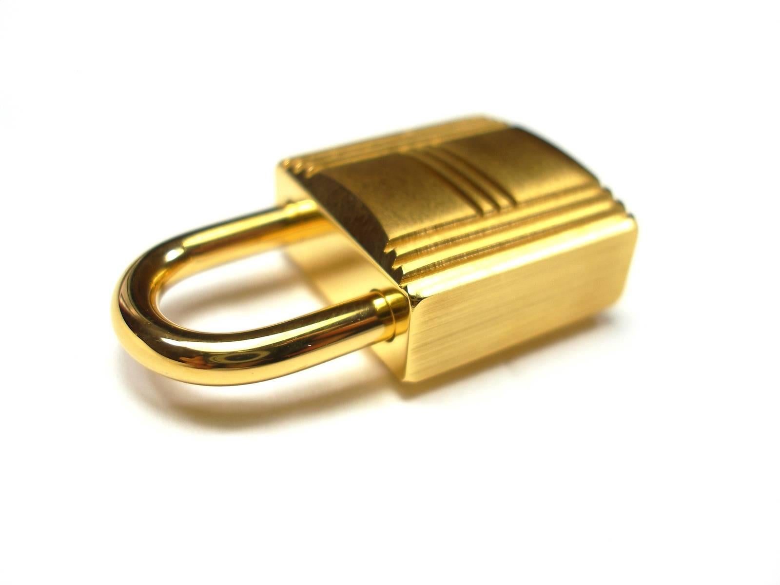 Hermès Cadenas Lock 2 Keys For Birkin or Kelly bag Gold plated shiny and brushed 2