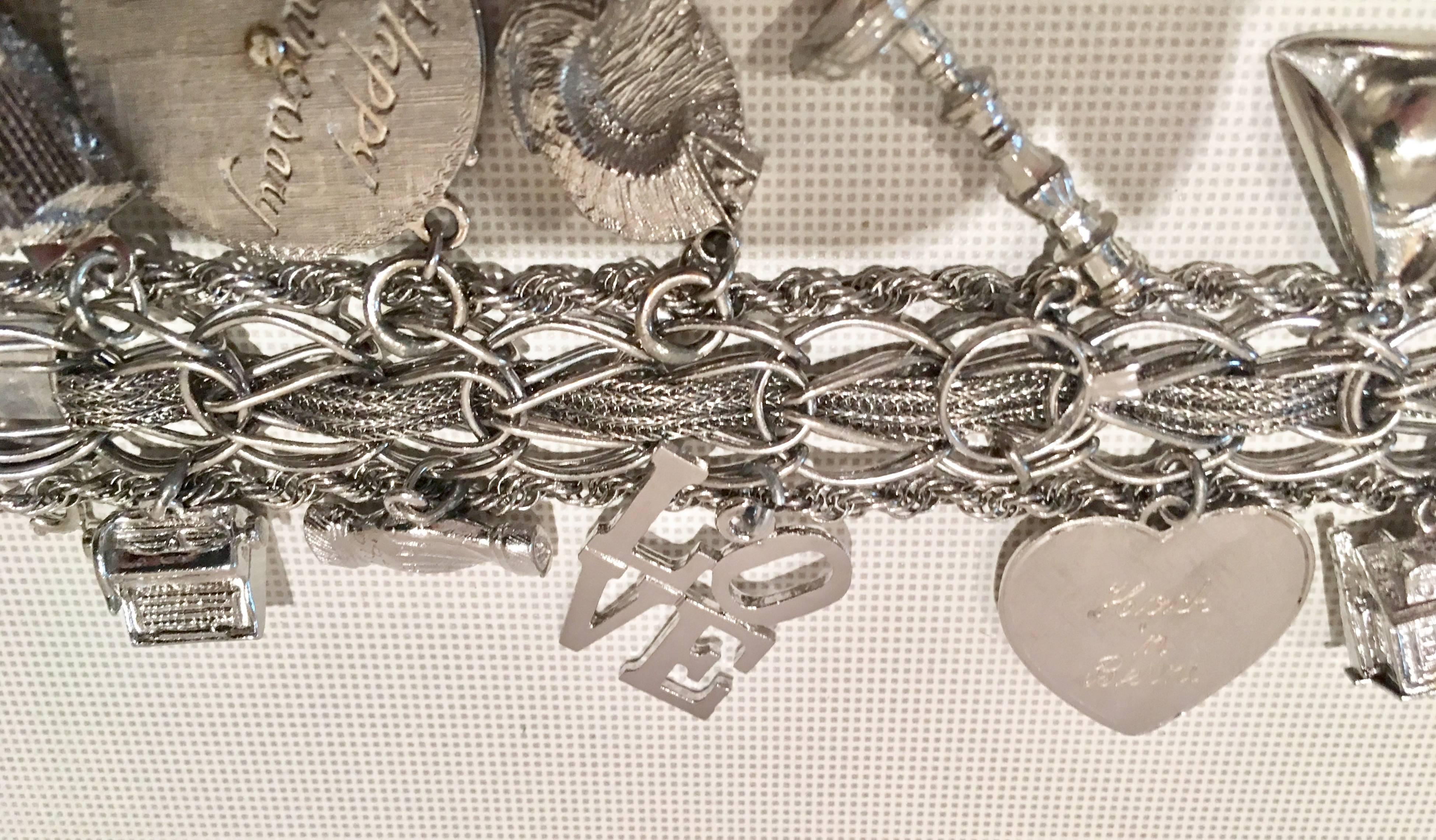 1960s Italian Sterling Silver 13 Piece Charm Chain Link Bracelet In Excellent Condition In West Palm Beach, FL