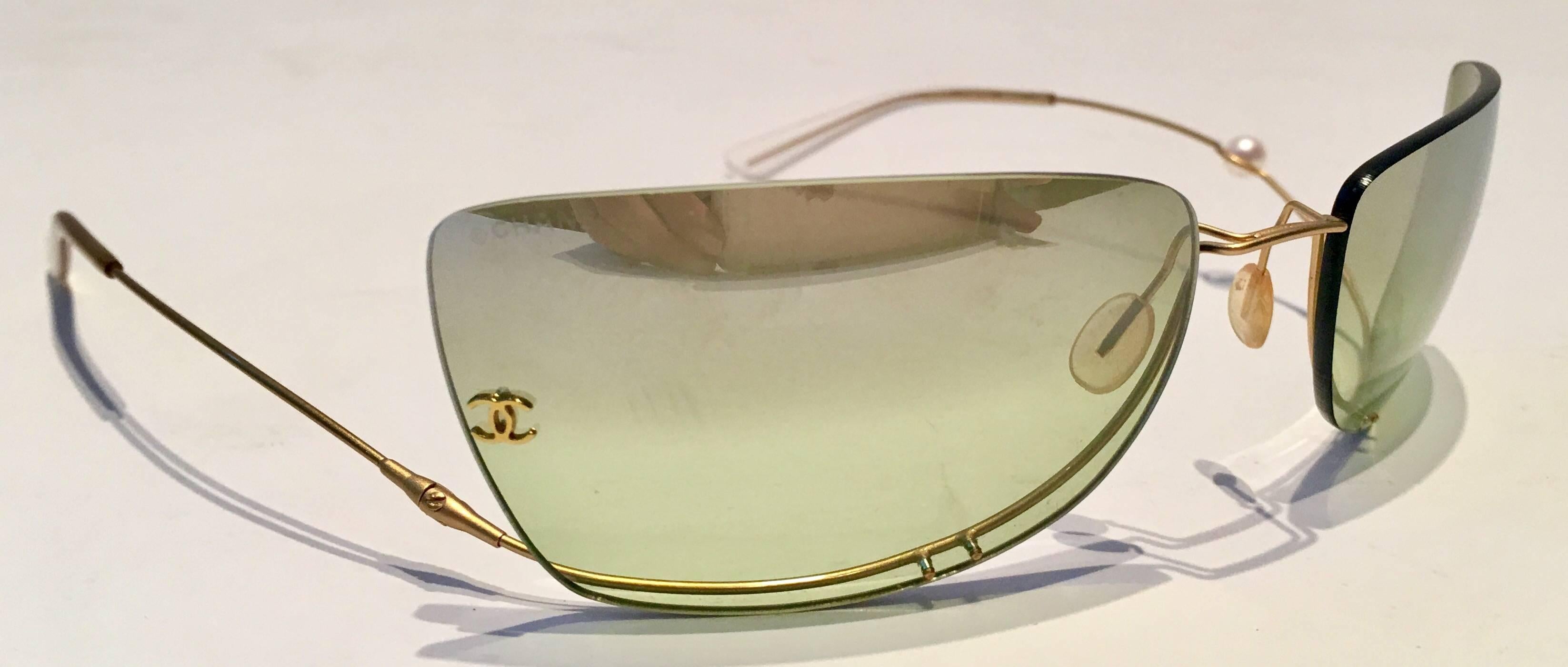 Chanel Freshwater Pearl Rimless and Mirrored "CC" Logo Sunglasses at  1stDibs | chanel rimless pearl sunglasses