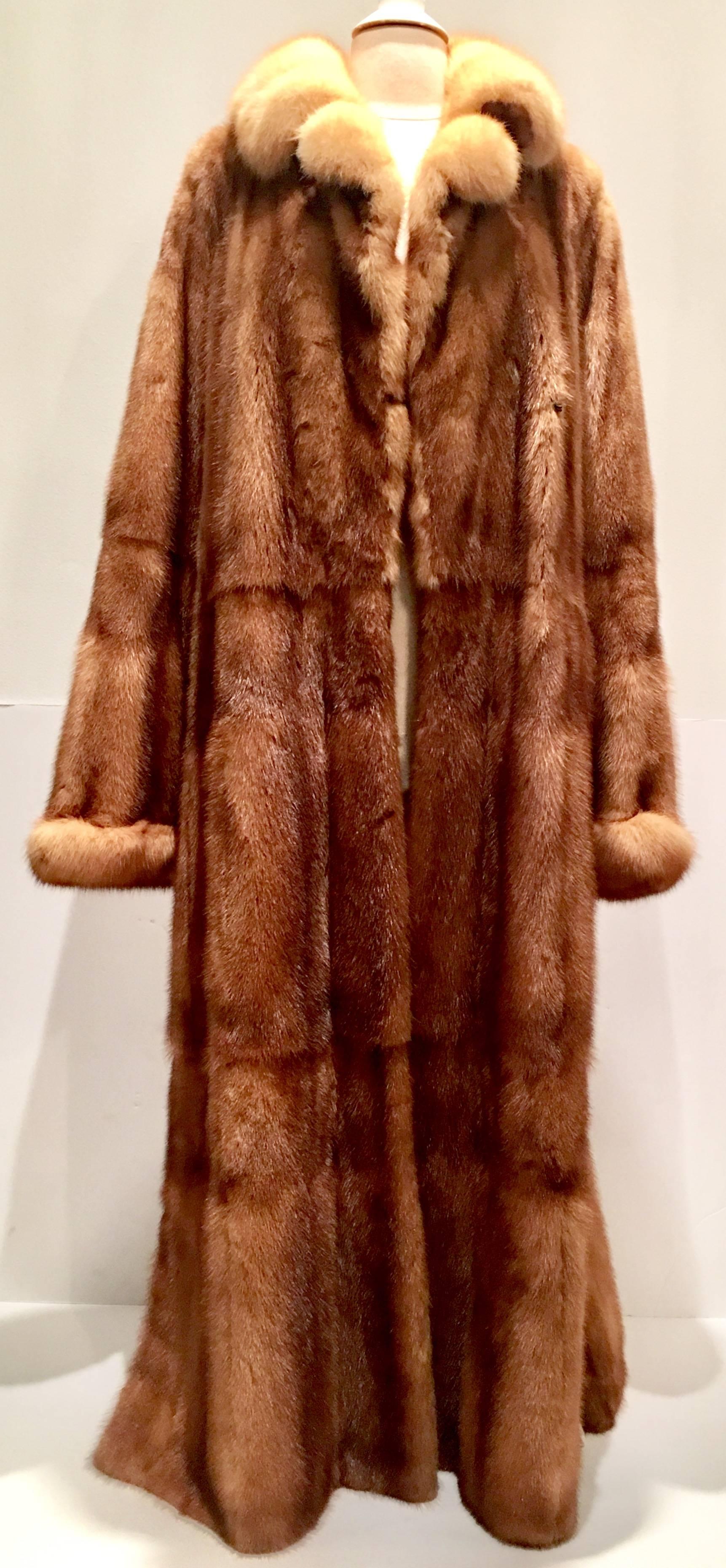 Incredible, Stunning and like new 21st Century Louis Feraud Paris full length whiskey dyed mink coat. Only Louis Feraud knows how to fabricate a coat at this level, of the highest quality, travels well and is lightweight yet as comfortable and