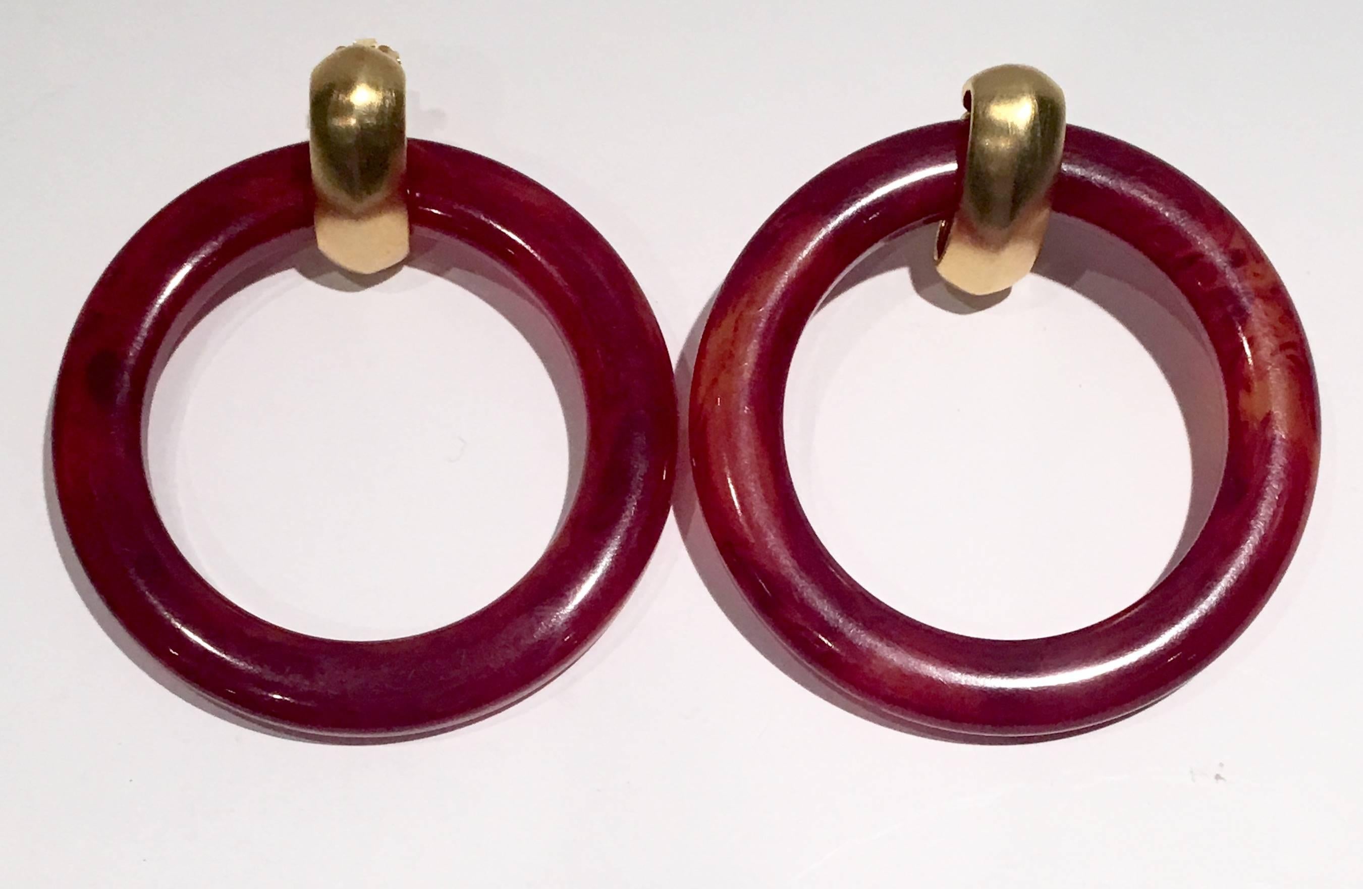 1960s Kenneth Jay Lane tortoise colored Bakelite large door knocker style hoop earrings with gold plate clip style posts. Made exclusively for Saks Fifth Avenue and signed Kenneth Lane.
