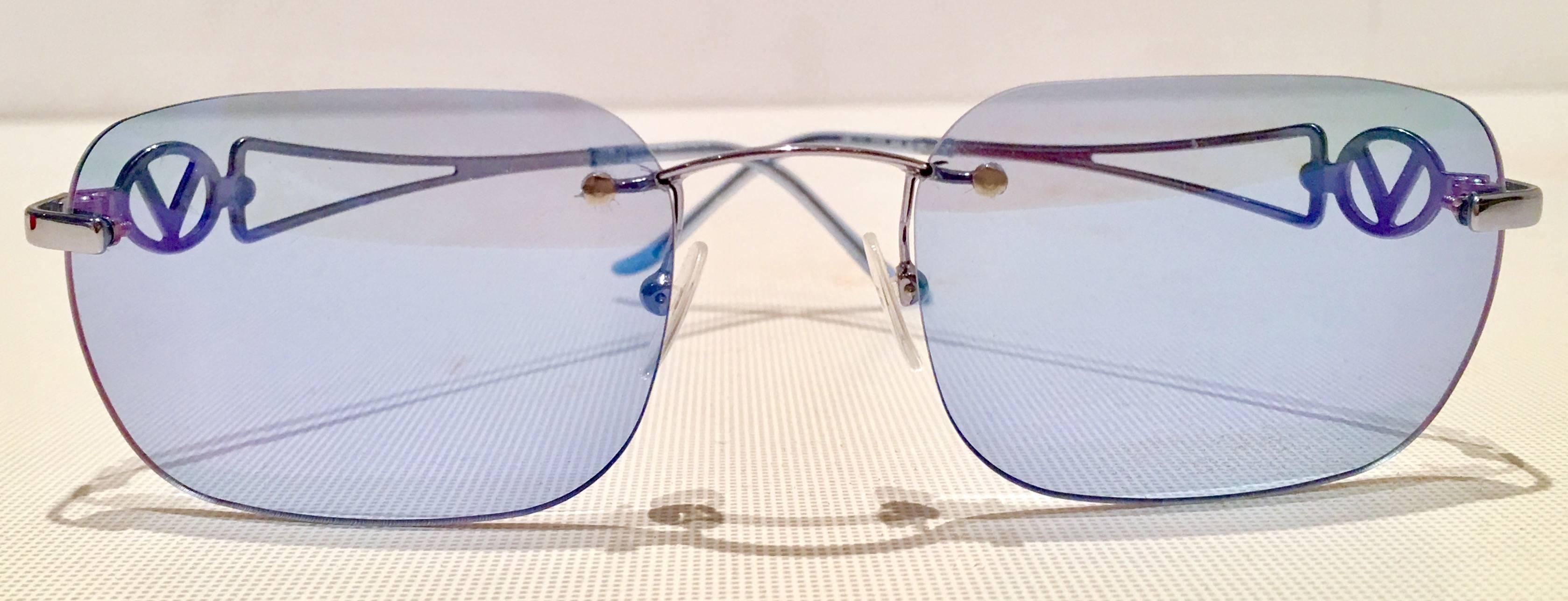 Cool & Contemporary Valentino lightweight blue "V" log sunglasses.Signed on interior arms,  A-130 Made In Italy 5251/S. Includes red Valentino protective storage case. 