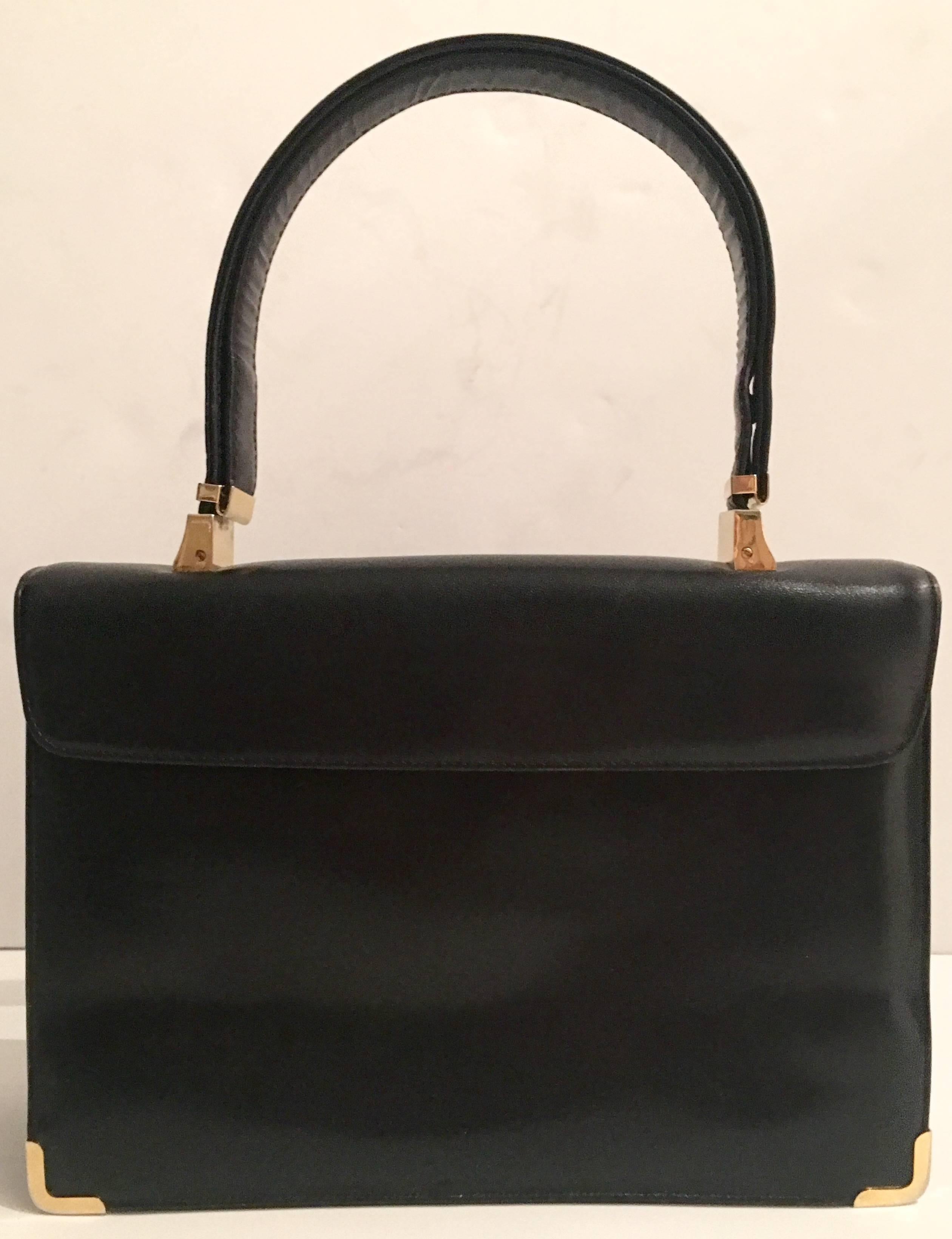 Black Vintage Leather and Two-Tone Metal Pocketbook by, Koret