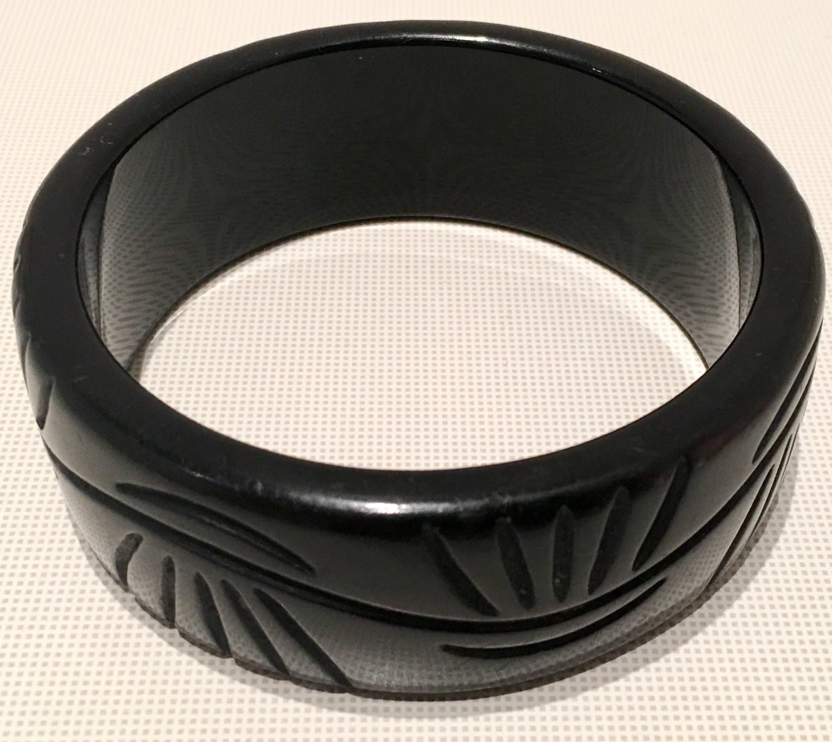 1930'S Art Deco Bakelite black, deep carved bangle bracelet. Interior diameter measures: 2.75
