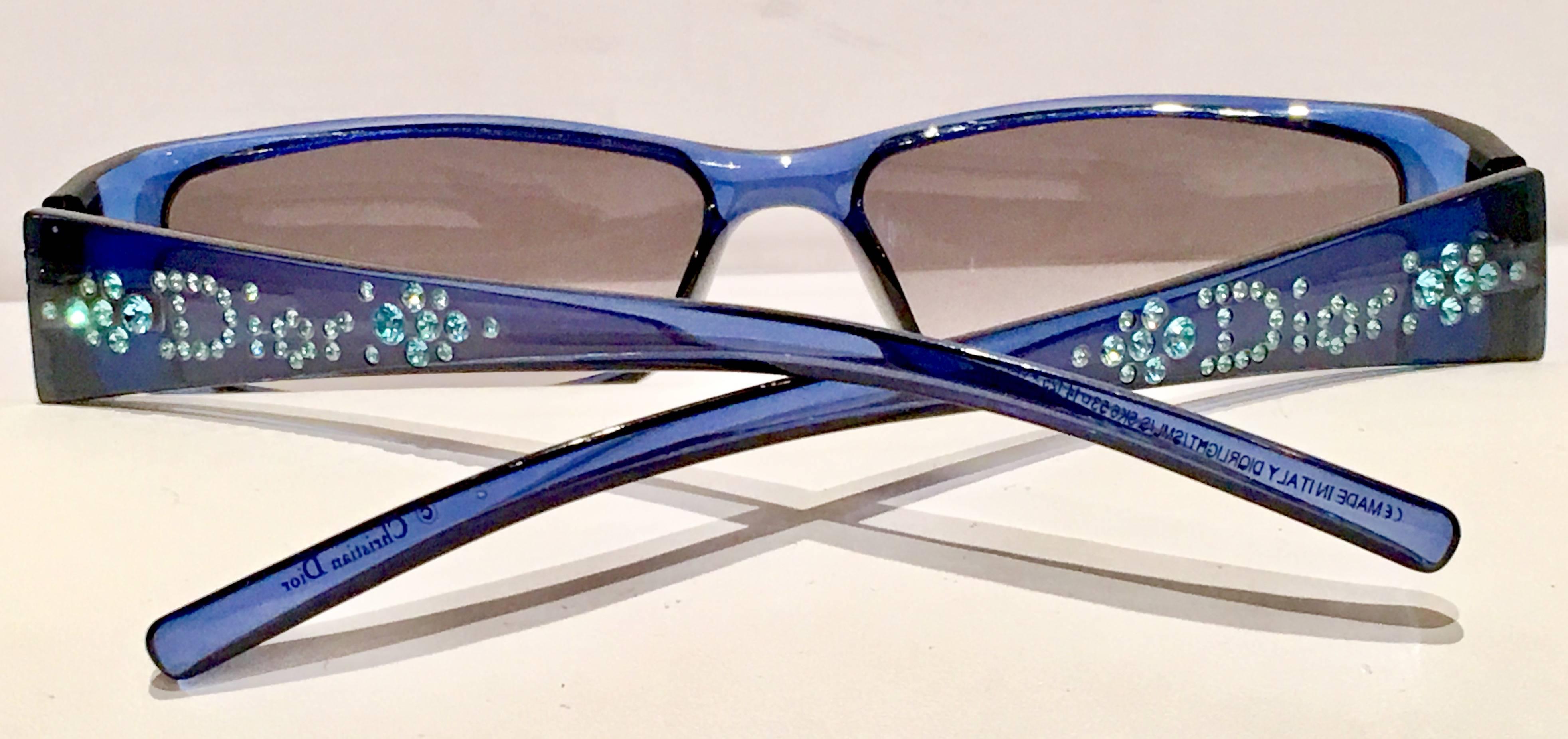 Rare Christian Dior vintage electric blue reader style sunglasses. Features bright blue embellished Swarofski crystal rhinestones on both arms with the 