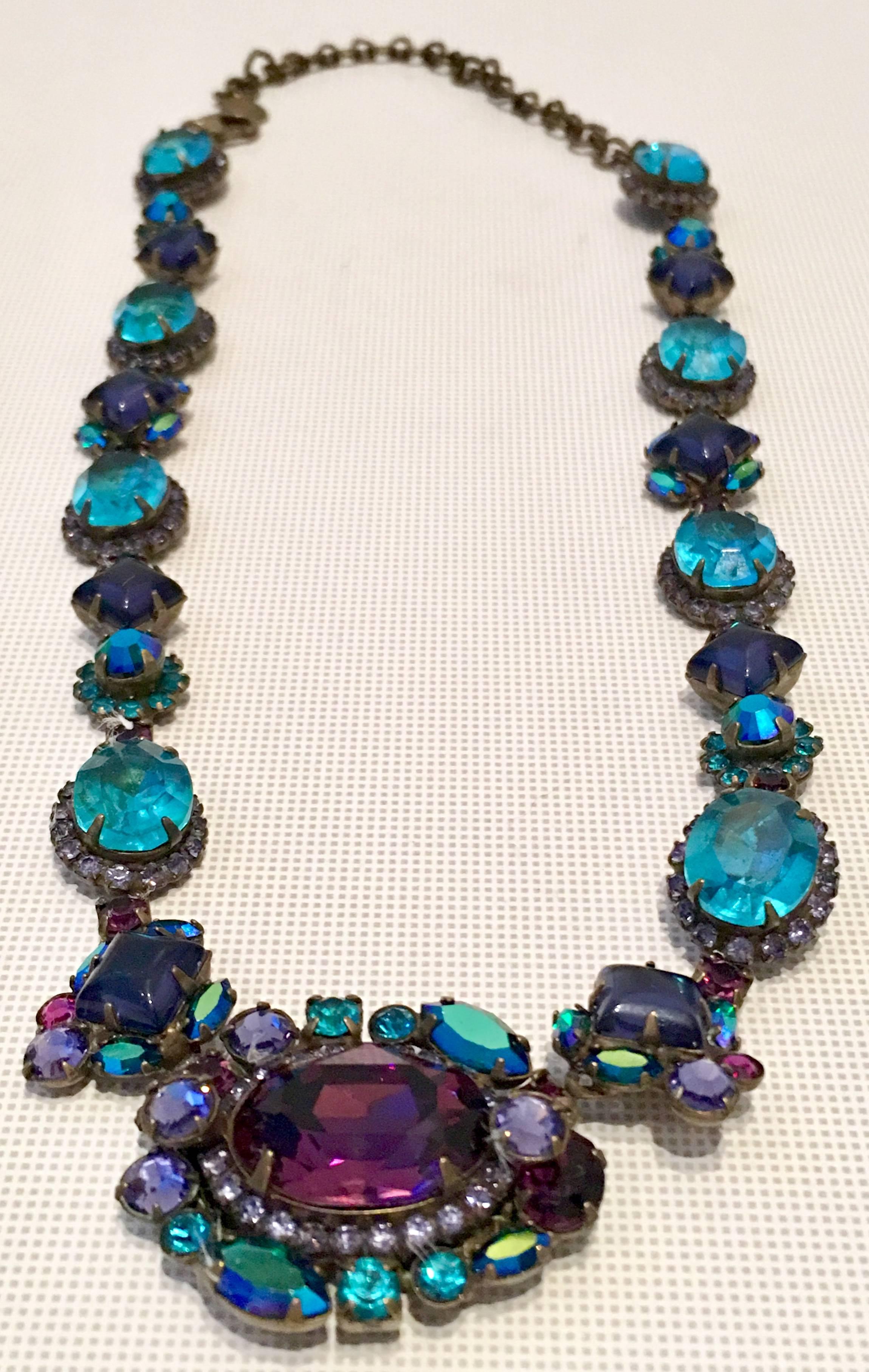  Contemporary Antique Bronze hand crafted prong set Swarovski Crystal Choker Style Necklace By, Sorrelli. Features, Amethyst, blue topaz and aurora borealis colored stones to name a few with abstract floral motif. This 