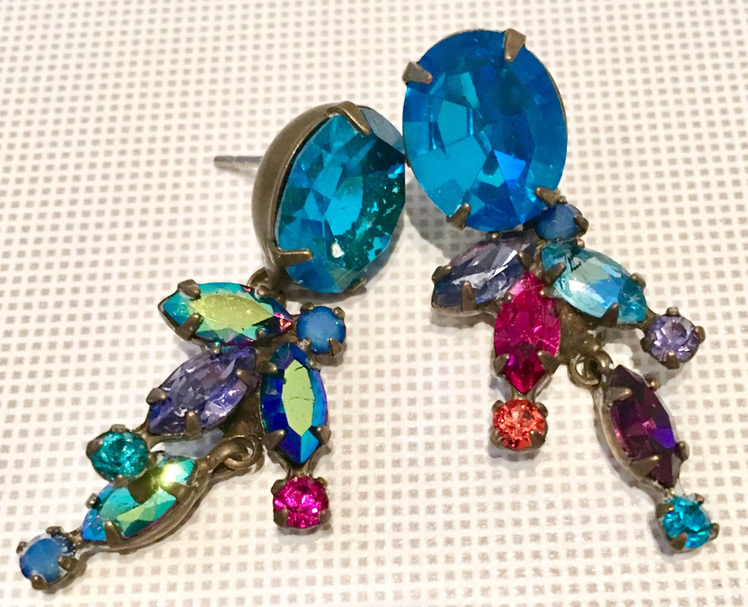 Gorgeous, Dramatic & Diminutive, Sorrelli Antique Bronze prong set Swarovski Crystal Drop Earrings, Signed.
Each piece is signed on the underside, Sorrelli and a pierced back style. Central blue topaz stone is approximately, .5