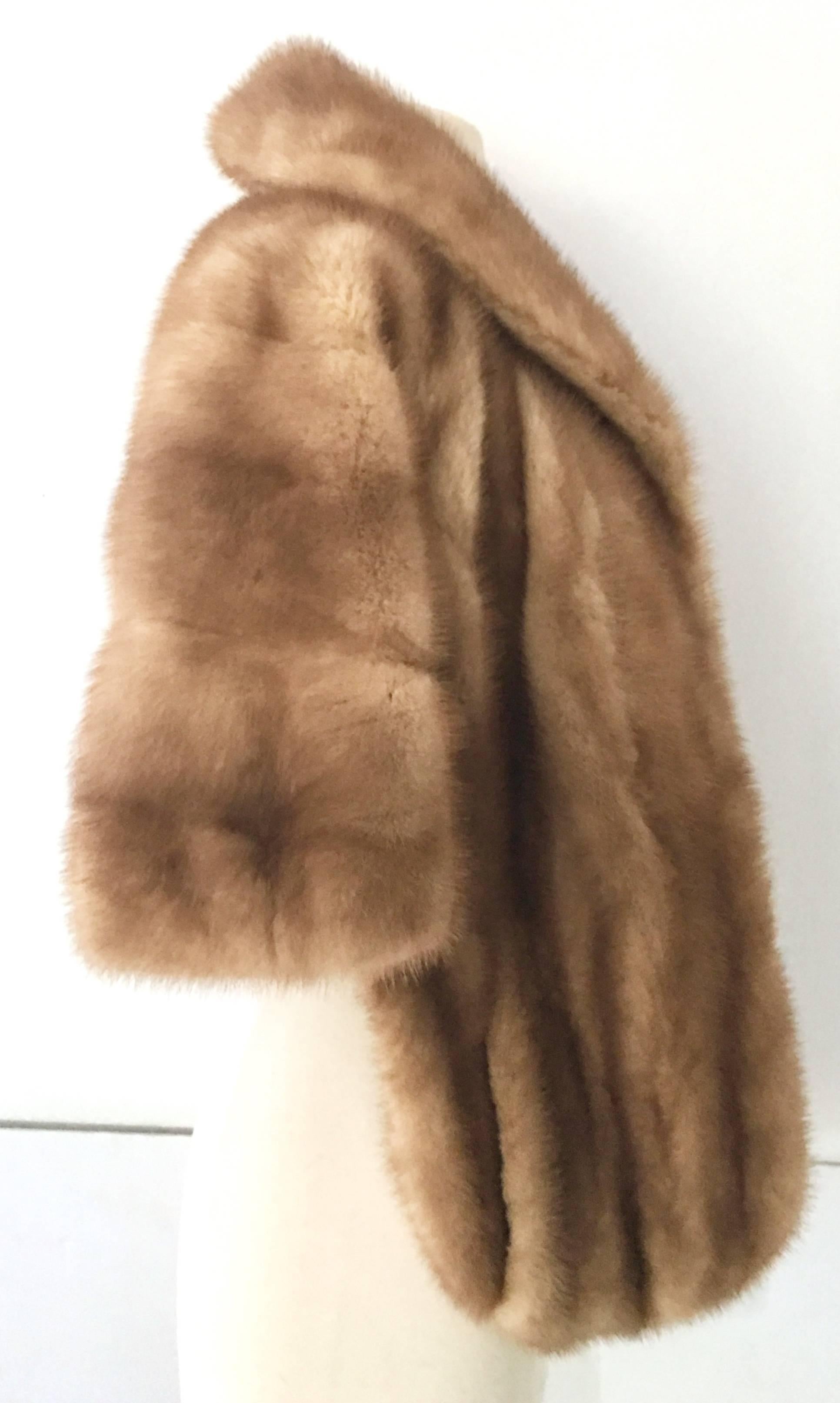 1950'S Whiskey Dyed Mink Fur Capelet By Ralph Rupley Houston. This gorgeous and well preserved mink features a generous collar, has two side pockets and is fully lined. Lining is monogrammed, "Delores Wilson" and the original furrier tag