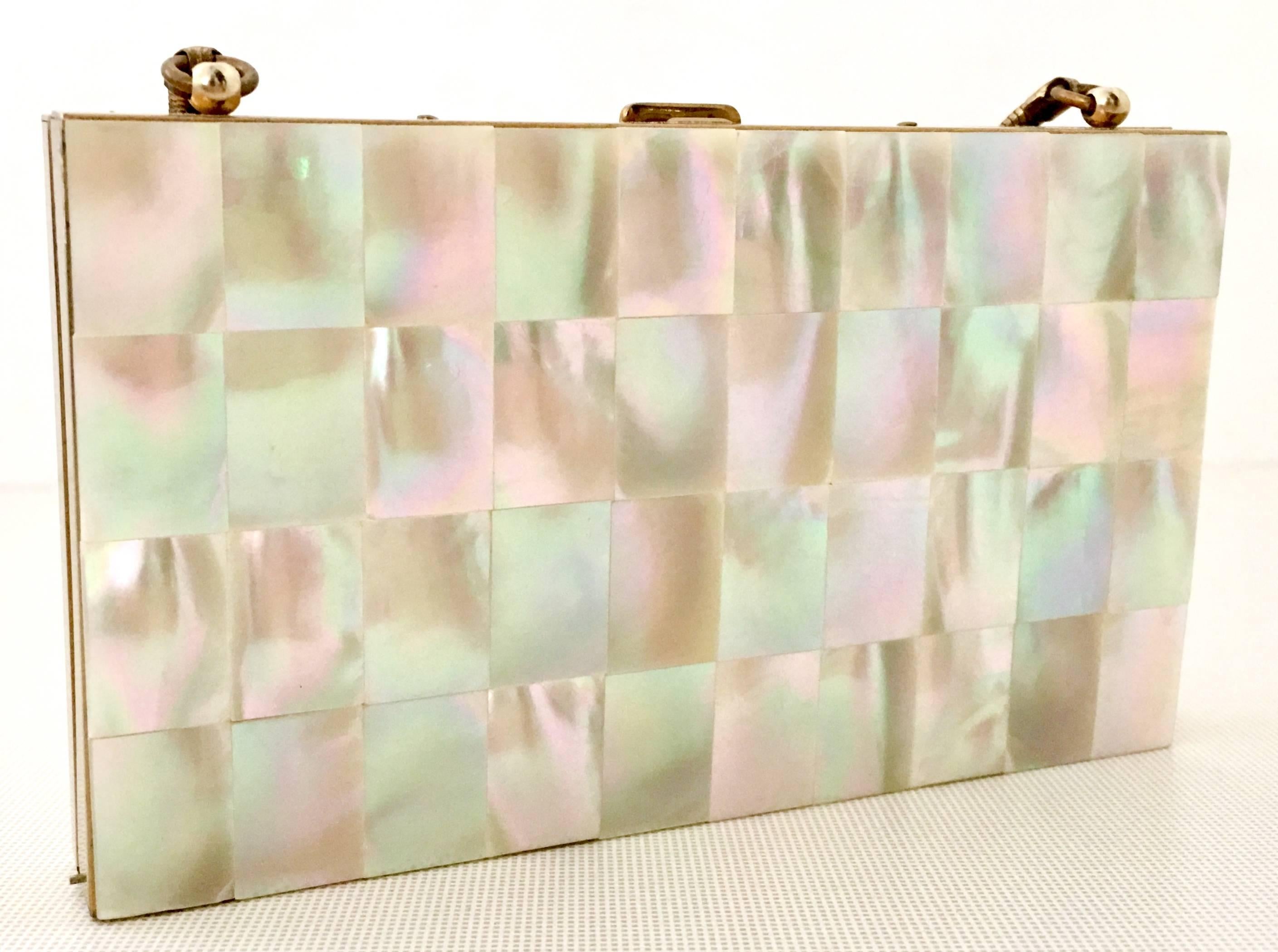 1940'S Mother Of Pearl & Brass Minaudiere Compact-Evening Bag. This lovely multi purpose piece features a solid brass frame with mosaic mother of pearl inlay, coil 