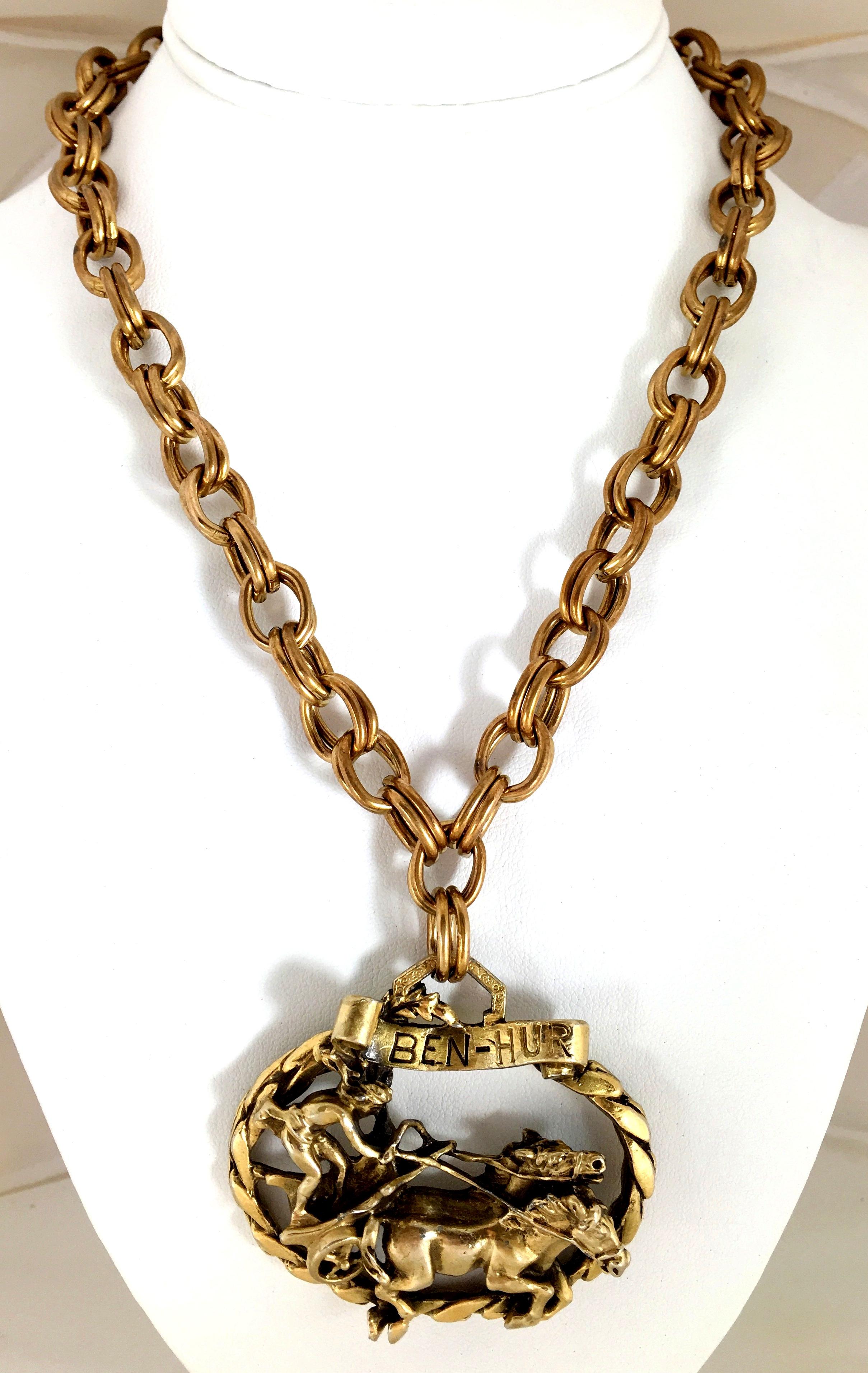 1960'S  Gilt Gold Ben-Hur pendant necklace in the style of Joseff of Hollywood. This iconic motif executed in  gilt brass plate with chain link necklace and large pendant. Joseff of Hollywood was well known for and is unsigned. Amazing intricate