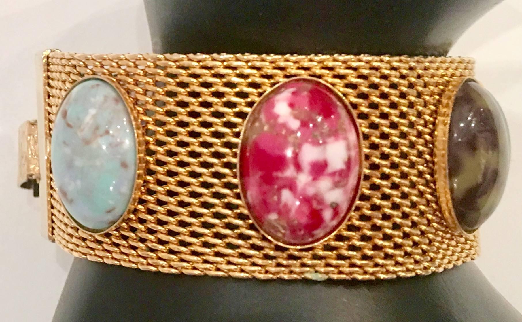 Vintage Gold Plate Metal Mesh & Faux Lucite Semi Precious Cabochon Stone Bracelet By, Sarah Coventry. The fold over locking box style clasp is signed, Sarah Cov.
Each of the six stones is approximately, .75