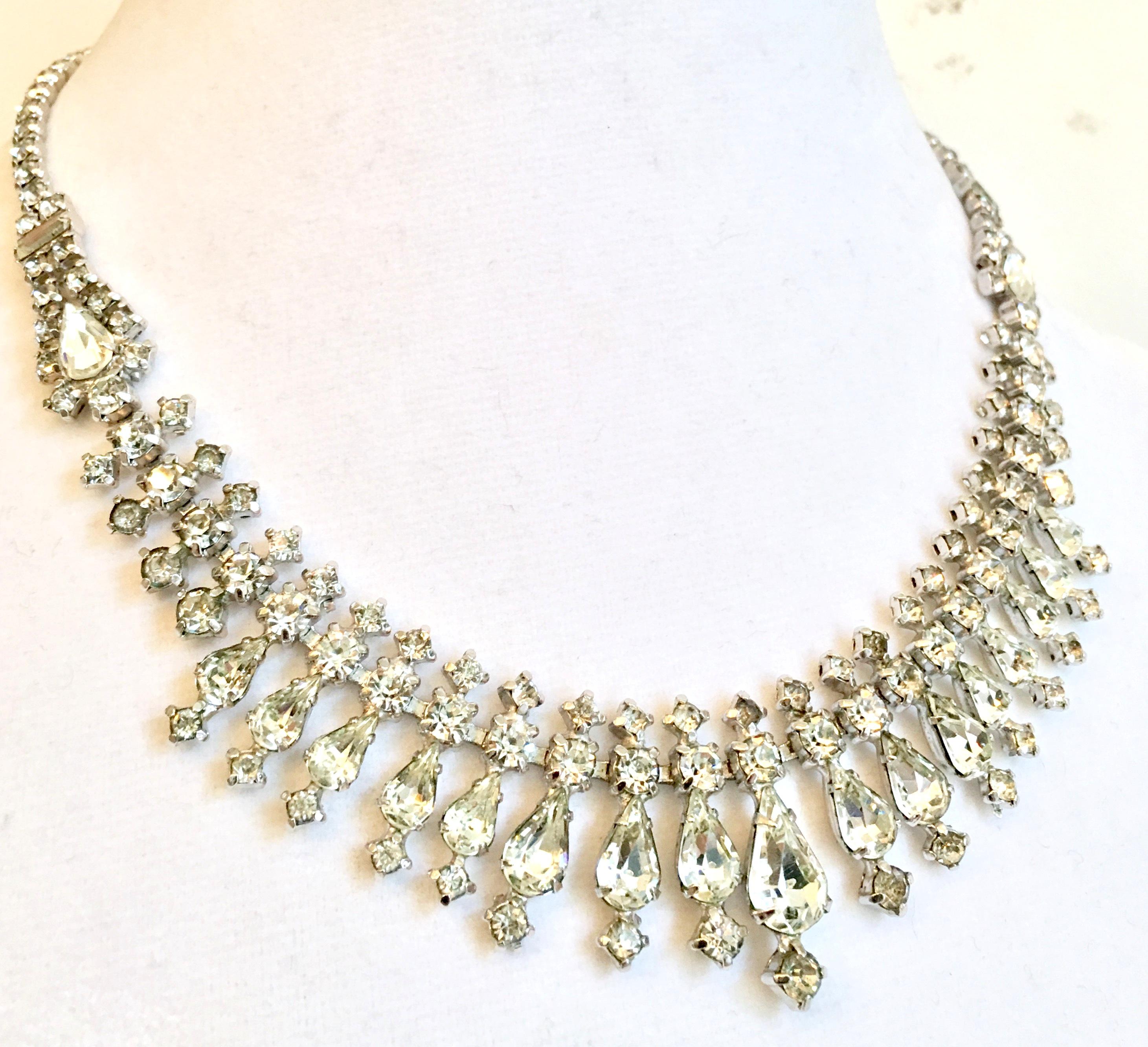 20th Century Silver & Austrian Crystal Clear Rhinestone Choker Style Necklace By, Ledo. This silver rhodium plate, prong set Austrian crystal cut and faceted rhinestone necklace features, brilliant Austrian crystal clear rhinestones in round, pearl