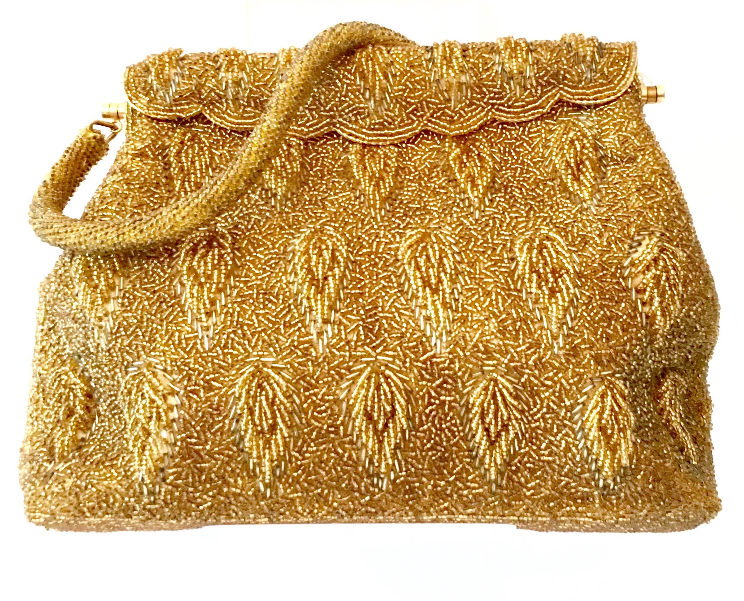 1950'S Gold & Gold Glass Bead "Hong Kong" Evening Bag By Stephen Chu Beaded Sweater Factory. Exquisitely hand crafted and features and clutch "accordion" style snap top frame closure and soft glass beaded shoulder strap with