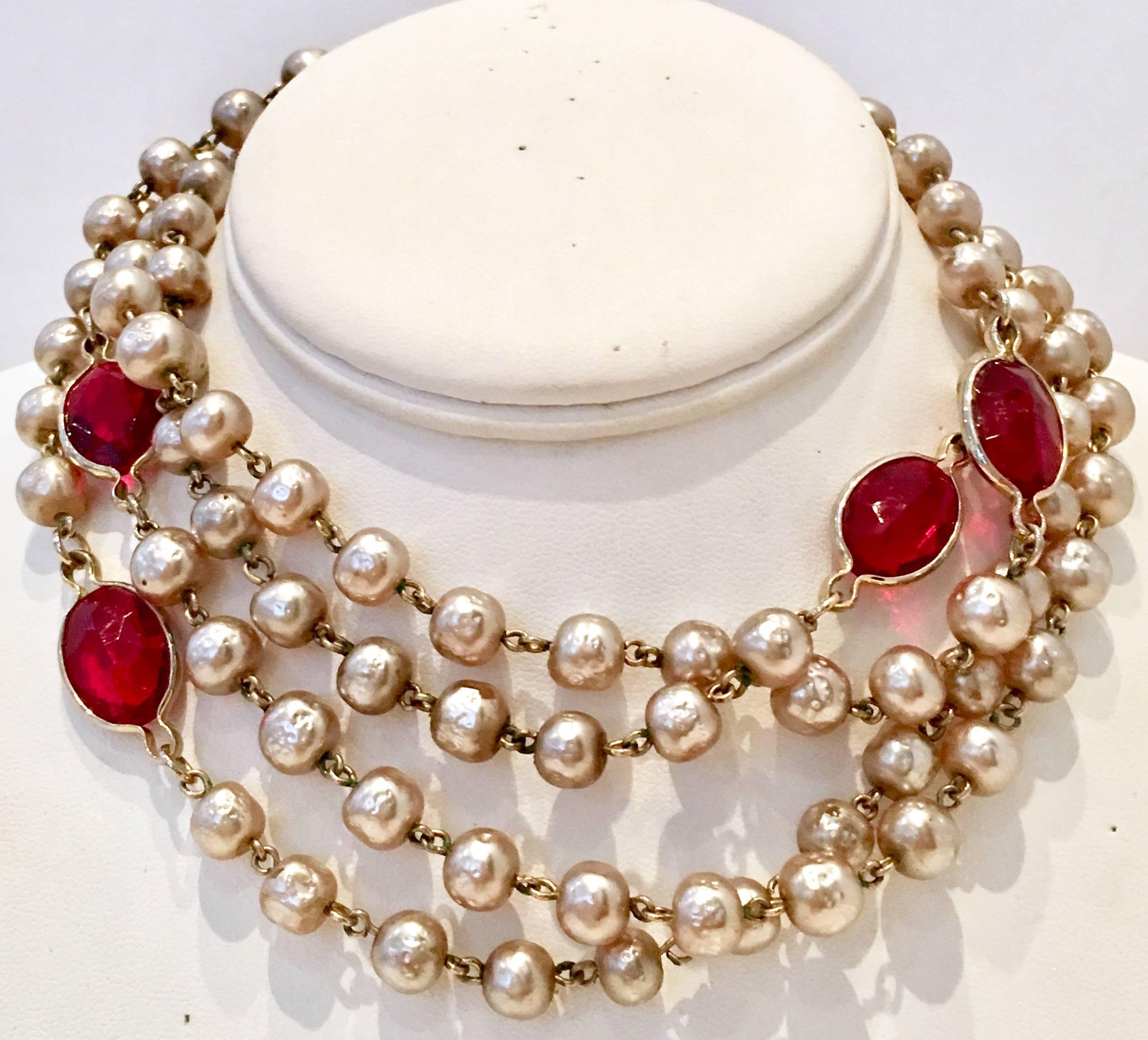 20th Century Exceptional faux Baroque pearl bead & faceted ruby art glass set in gold plate opera length necklace by, Coro. The pearls are each approximately .25 