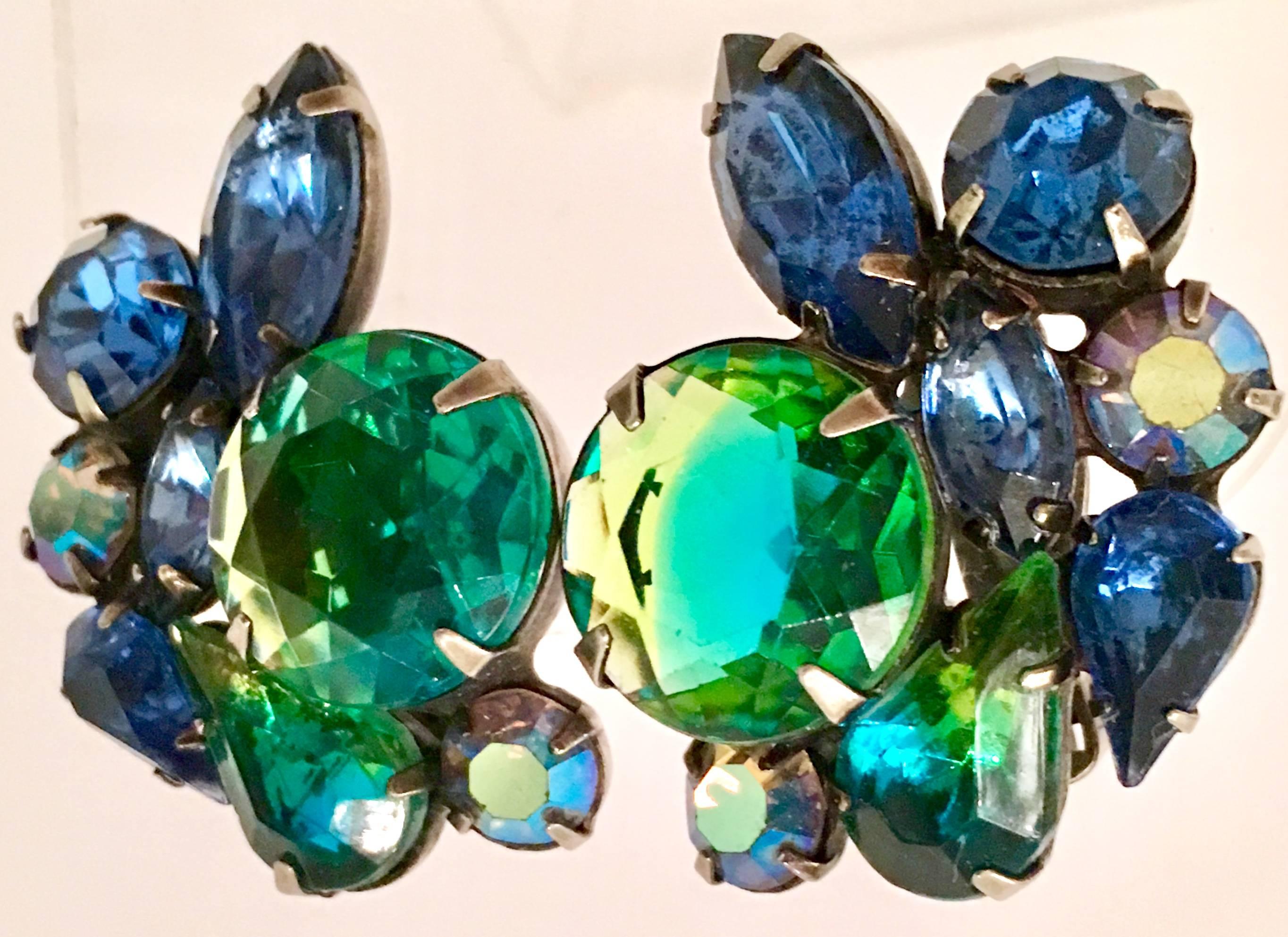 1950'S Silve & Swarovski Crystal Rhinestone Abstract Floral Earrings. Prong set in gunmetal silver tone metal, these brilliant cut and faceted blue, green and aurora borealis crystal rhinestone earrings have a 