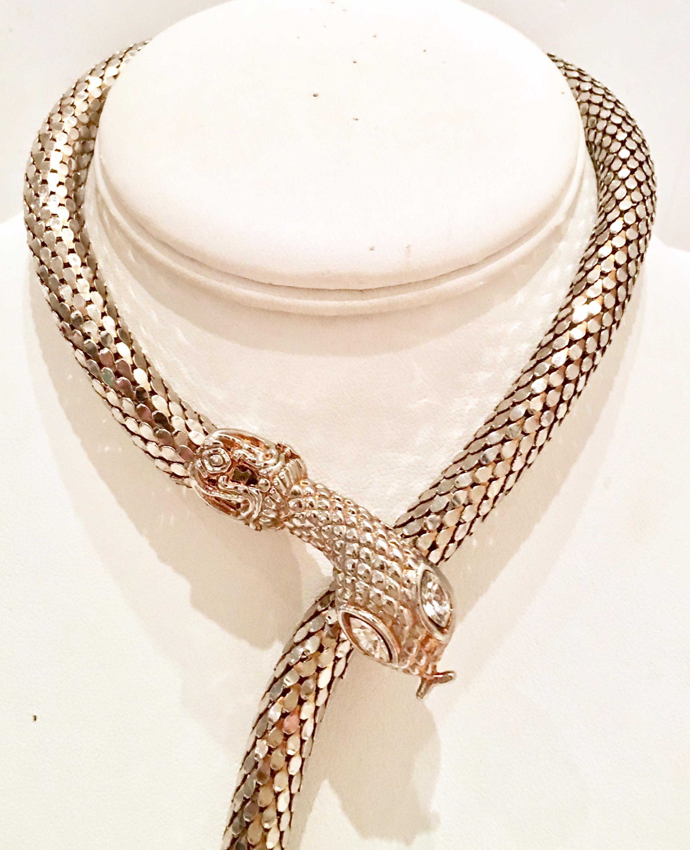 20th Century Silver & Gold Gilt Metal Mesh & Swarovski Crystal Clear Rhinestone Adjustable Coil Snake Necklace By, Whiting & Davis . This coveted and rare piece features a silver coil metal mesh body with gold gilt detail at the snake head and tail.