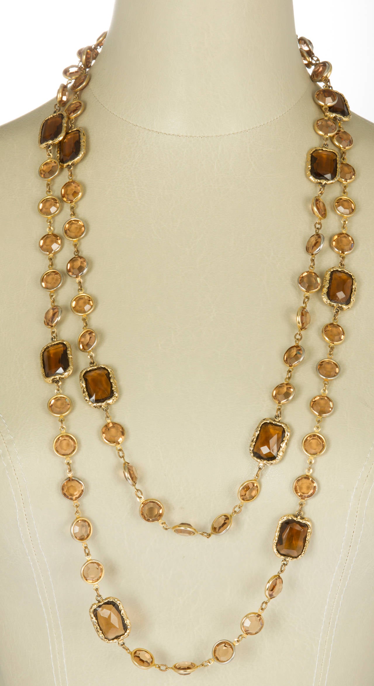 This is an unusual colored chicklet necklace, the color of the crystal is close to a smokey quartz or topaz.