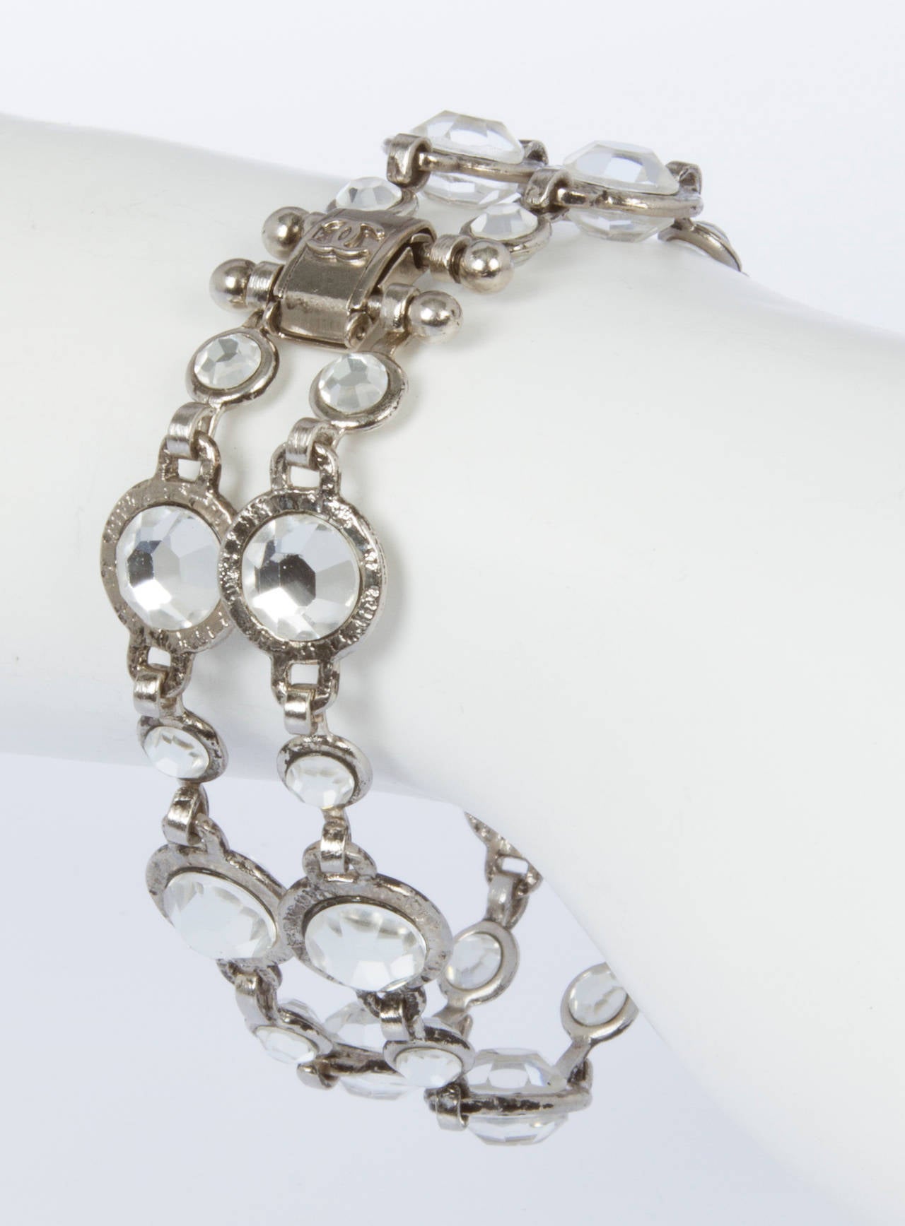 This is a simple elegant bracelet, the crystals are set in a platinum plated meta, from the 1998 Spring collection.