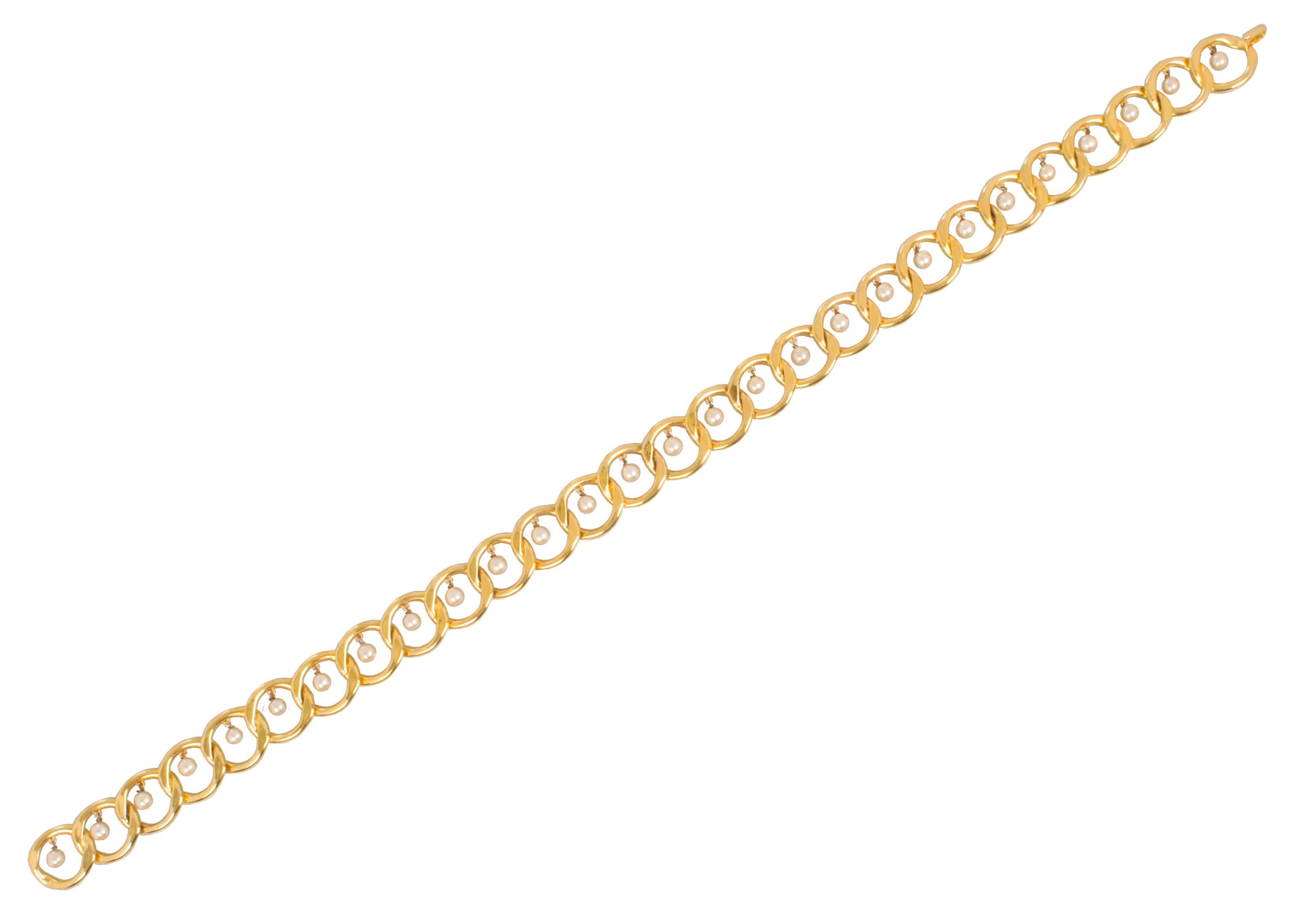 This is an elegant belt consisting of gold plated links with dangling pearls that move when you walk.  It could be worn as a necklace.