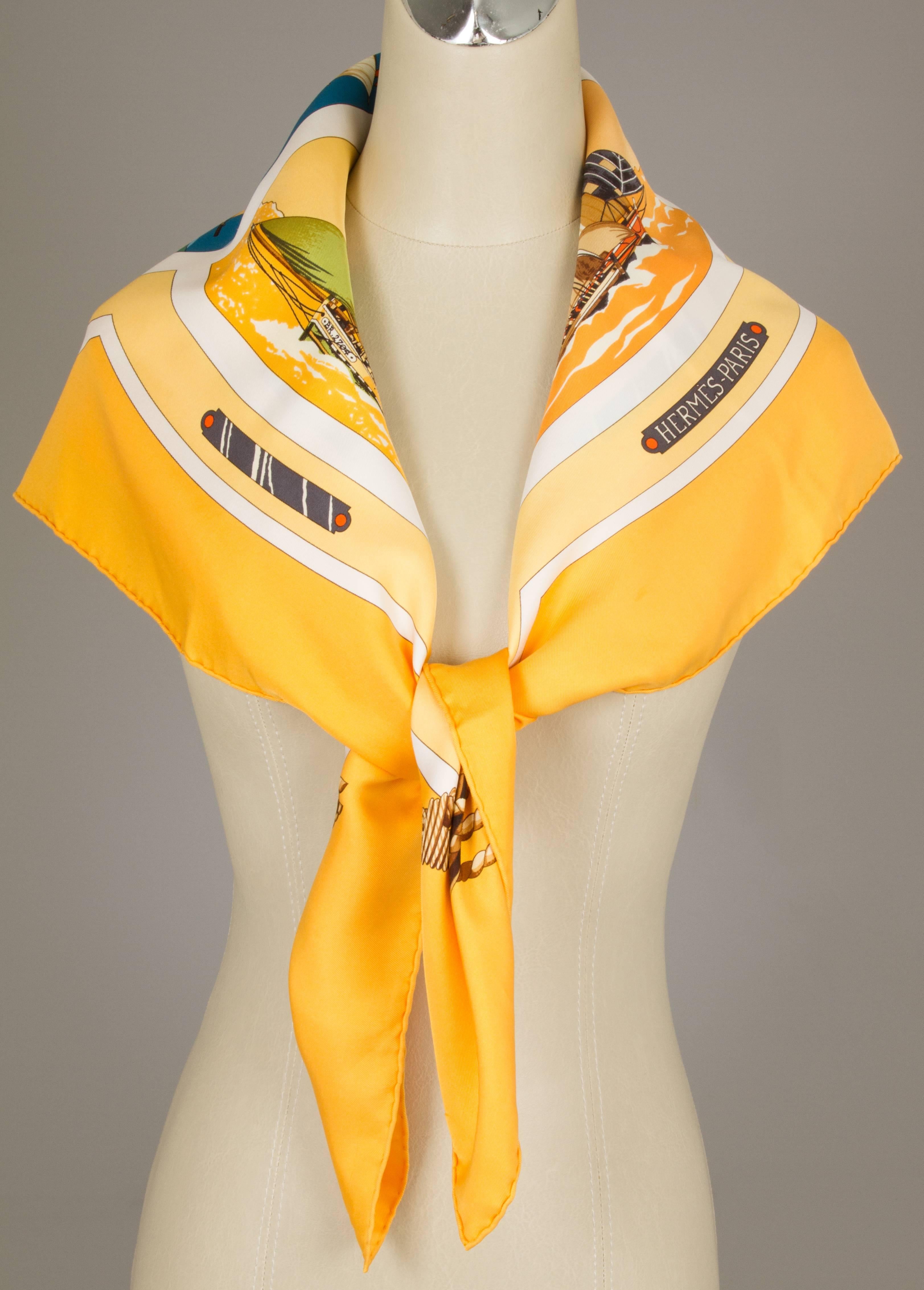 Designed by Loic Dubigeon, this scarf has a nuatical theme with imagery of various schooners.