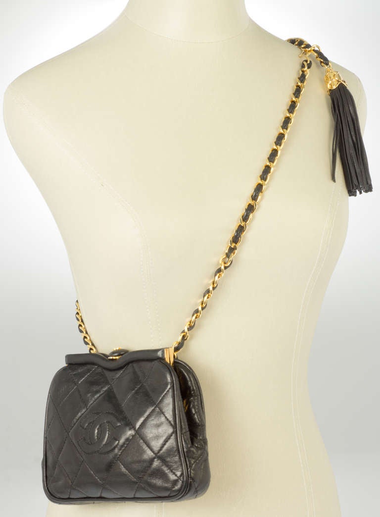 This chic bag  can be worn as a shoulder bag, or around the hips or waist as a belt purse.

The strap measures 37