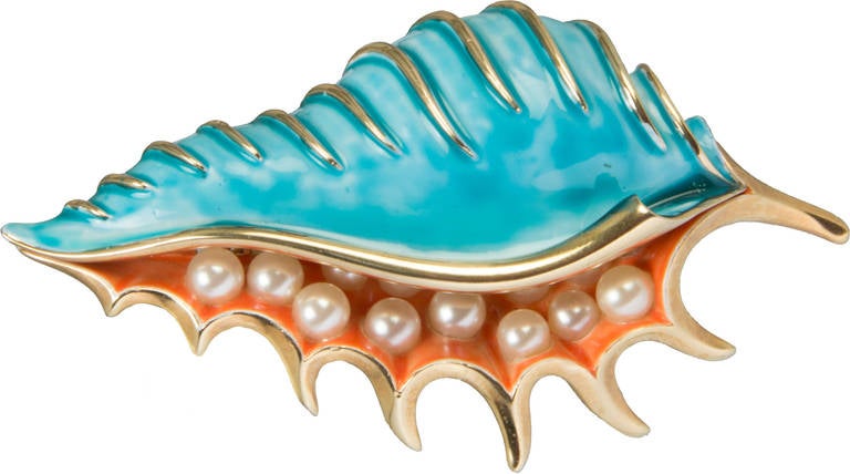 This is a charming sea shell brooch designed by Alfred Philippe who previously designed for VanCleef & Arpels.