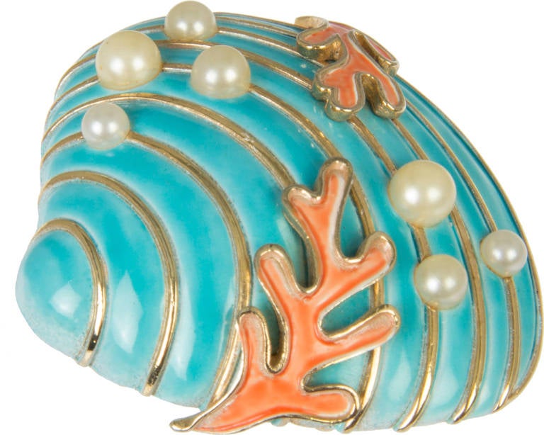 This is a charming sea shell brooch designed by Alfred Philippe who previously designed for VanCleef & Arpels.