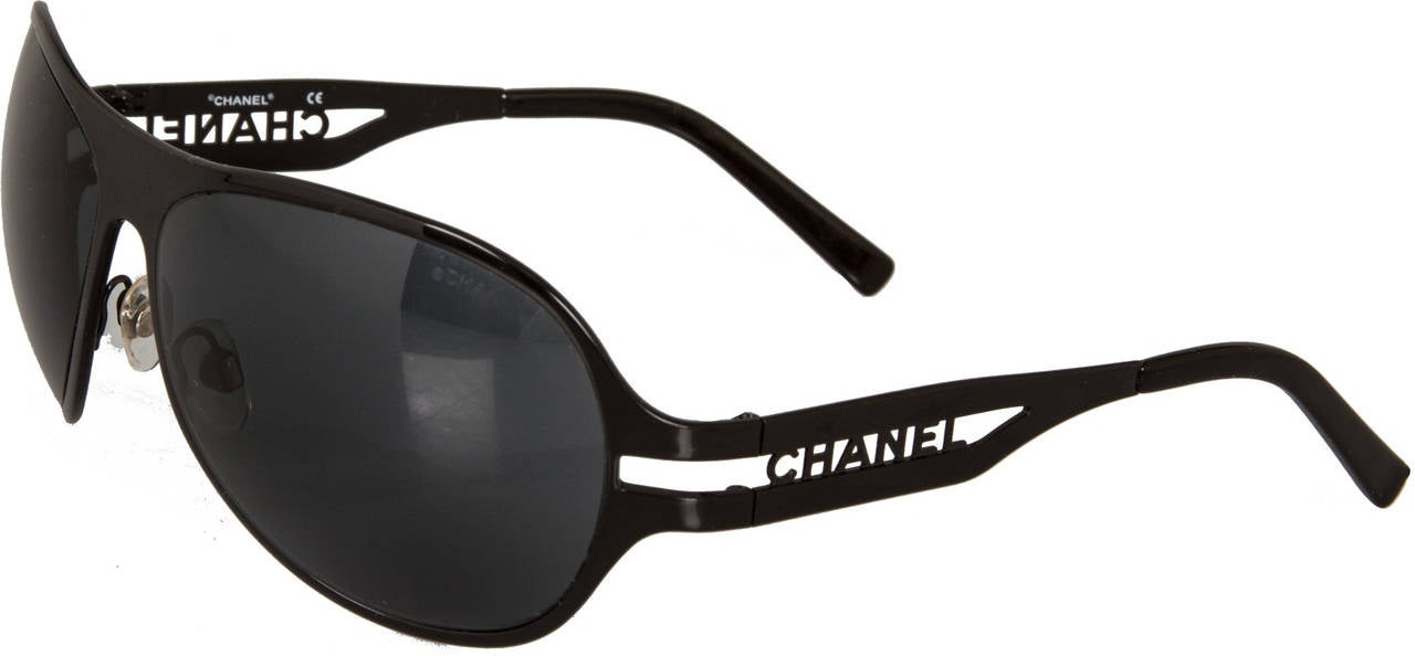 These are a great looking pair of sunglasses with CHANEL spelled out on each arm.