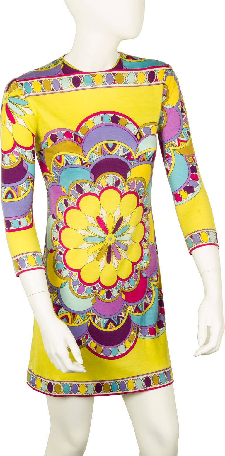 This is an  Emilio Pucci  Cashmere and Silk Print Dress,
in a multicolor mosaic print motif, with cropped sleeves and a zipper back closure, together with a matching rope belt with faceted clear beaded tassels. Labeled: Emilio Pucci.
It is labeled
