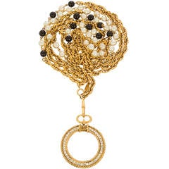 CHANEL Black and White Pearl Necklace with Rhinestone Magnifying Pendant
