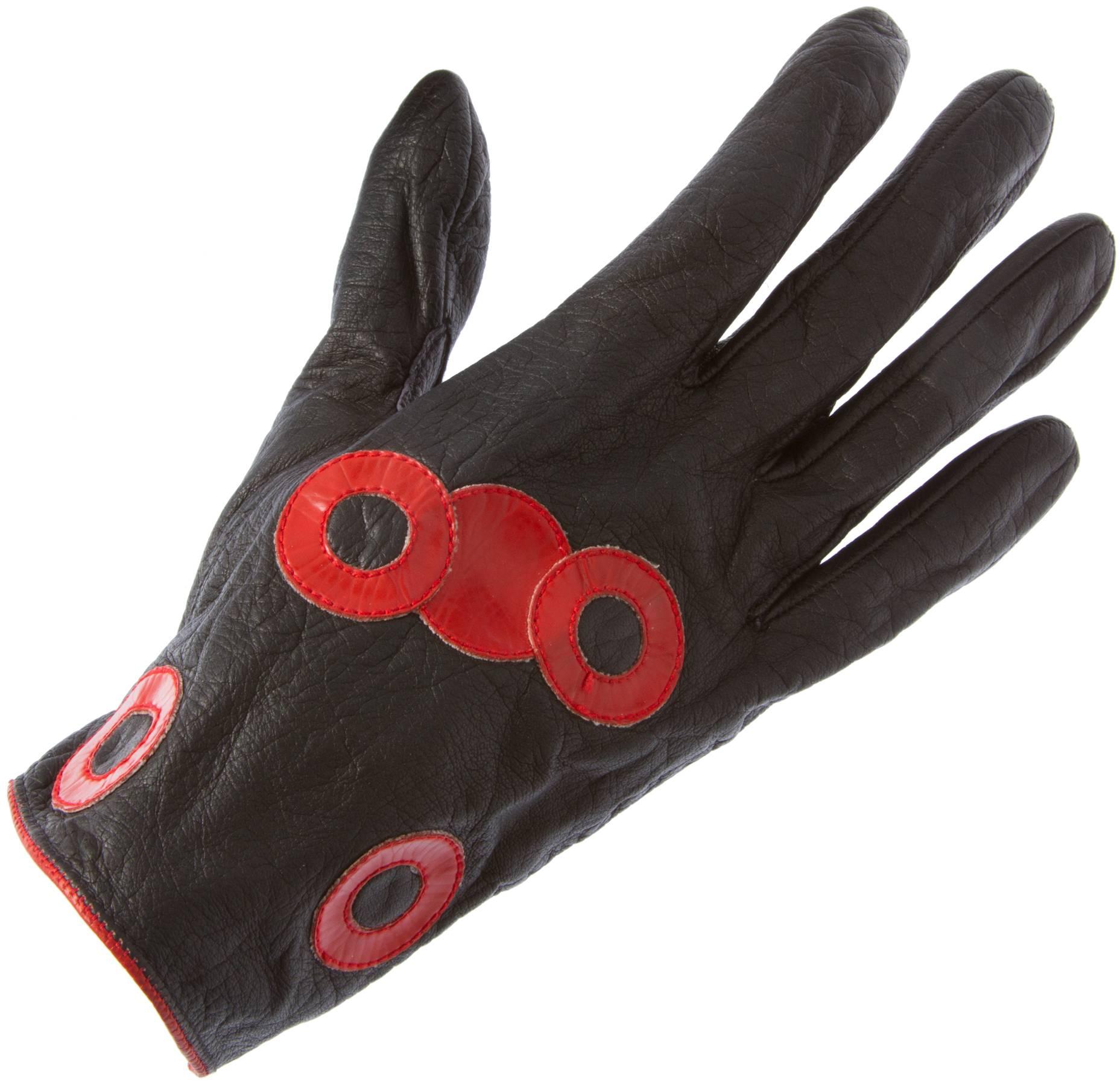 These are fun vintage smaller gloves.  Black with red appliques.