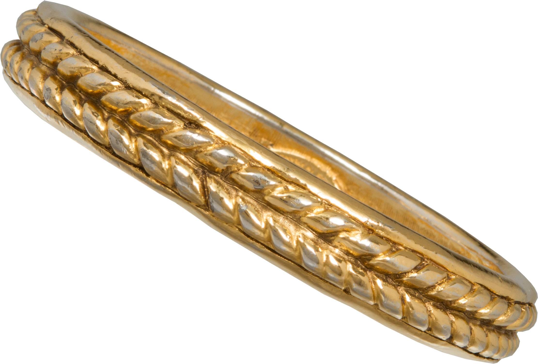 This is a wonderful bangle that looks great on its own, or stacked with other bracelets.  Heavy and richly plated gold, the interior dimension is 2.63.