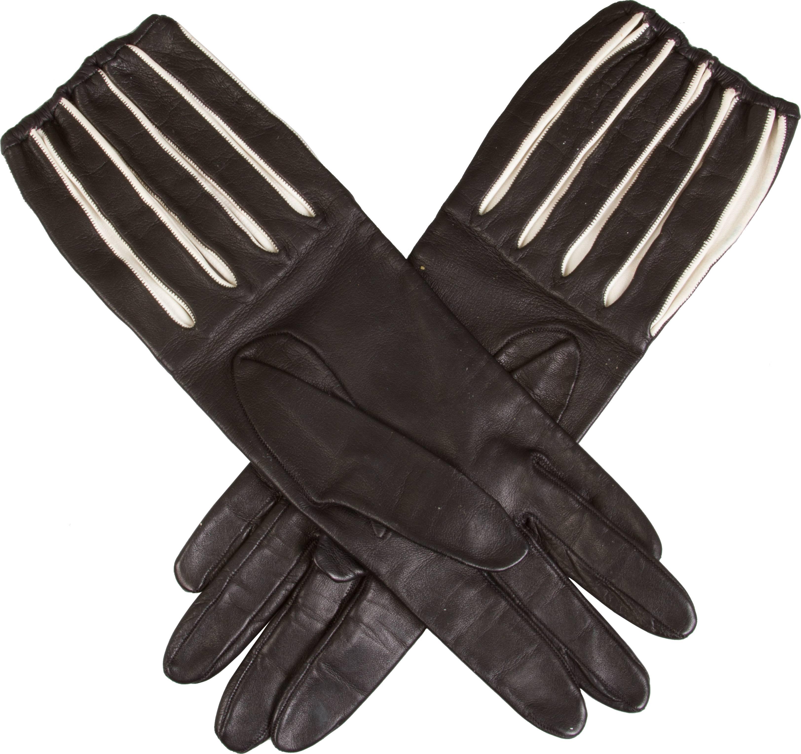 These are Tres Chic.

From the tip of the finger to the top of the glove is 11 inches. These Gloves are a size 6 1/2.