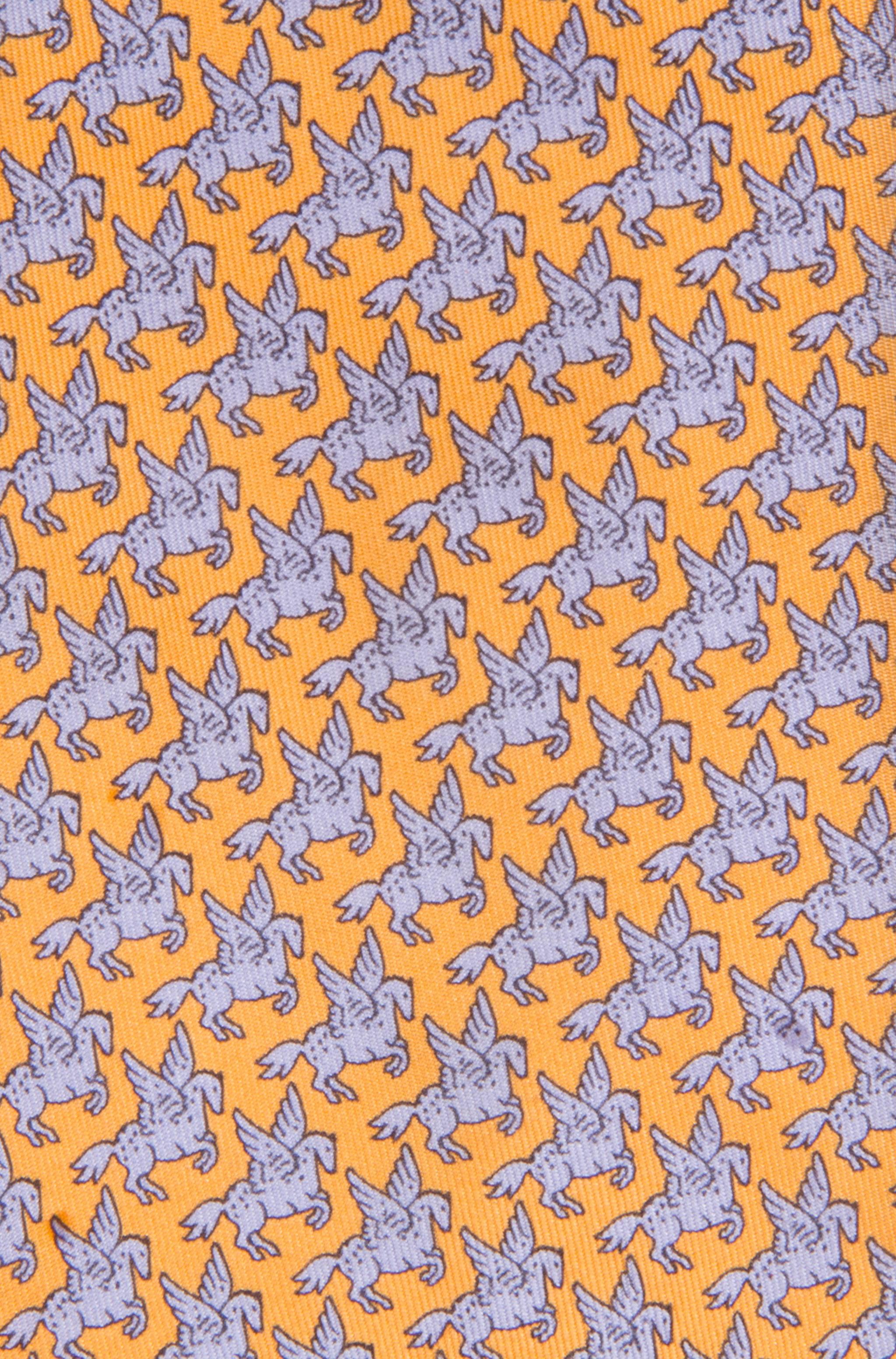 This is a wonderful tie with an overall pattern of Pegasus in flight.