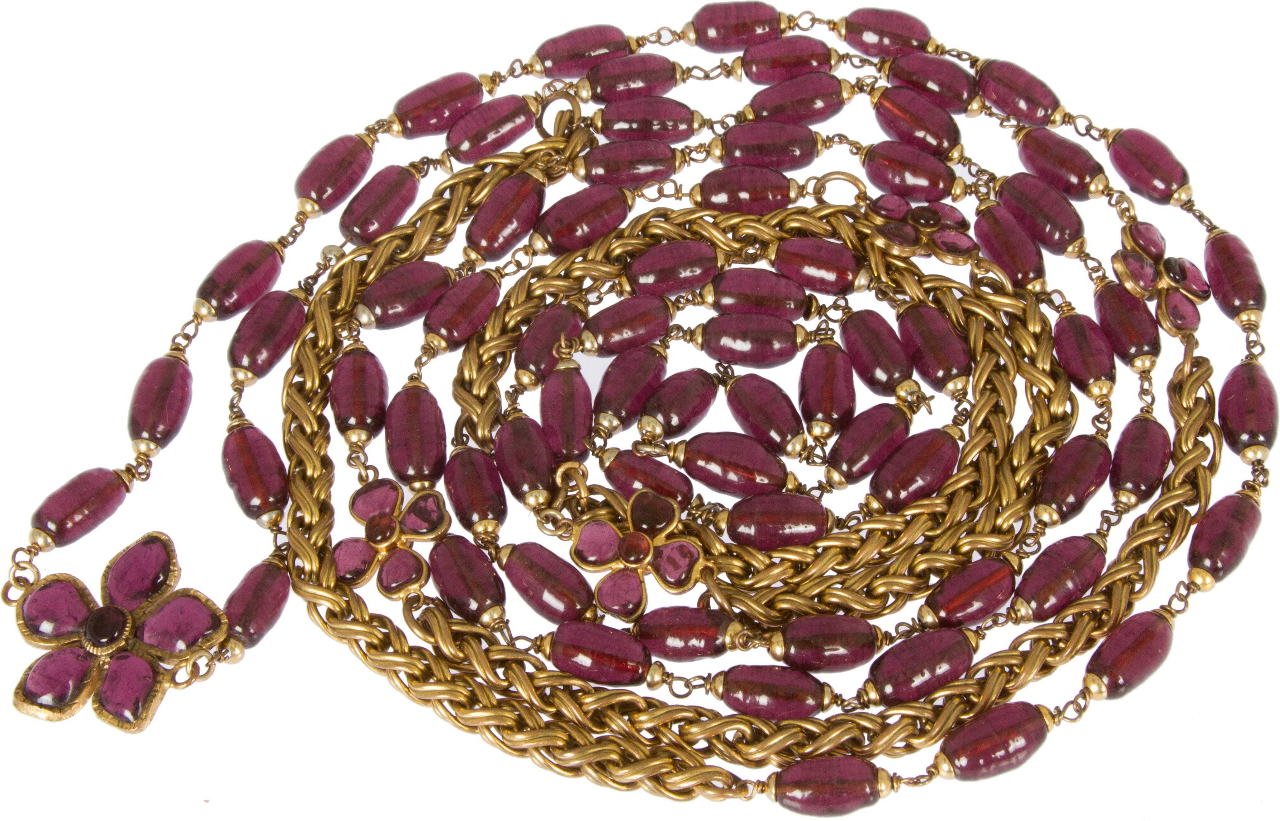 This is a stunning amethyst colored gripoix necklace.  The long length makes this a very versatile piece as it can be worn in many ways and it looks great with other CHANEL necklaces as a layering piece.