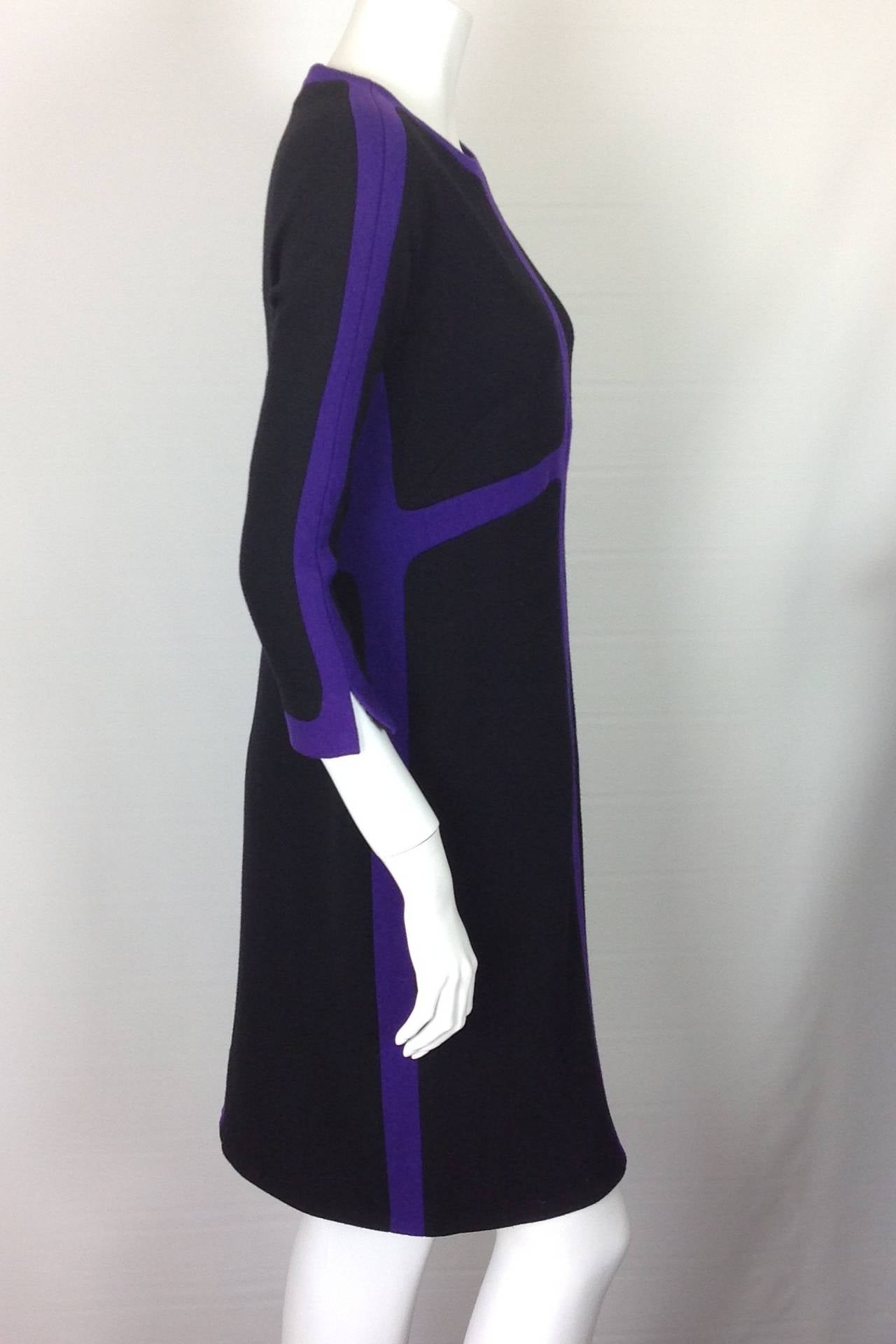 Fall 2013 two tone Ralph Rucci bodycon dress.  Black and purple, oh my!
95% wool, 5% elastane for a snug fit.  Fully lined.  21.50