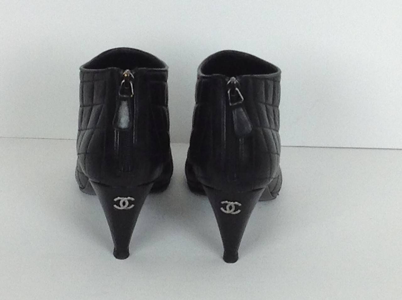 Black Chanel quilted bootie with classic cap toe, from Fall 2014!
3