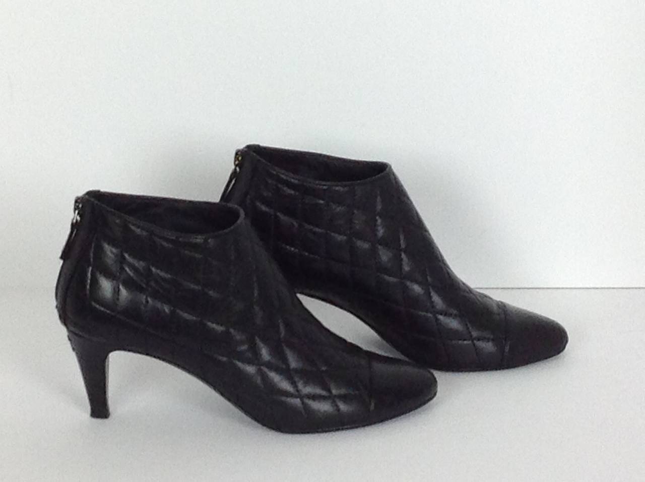 This season Chanel quilted ankle boots size 39 at 1stDibs