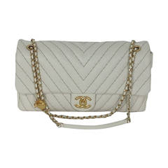 Cream Chanel Chevron Handbag with charms