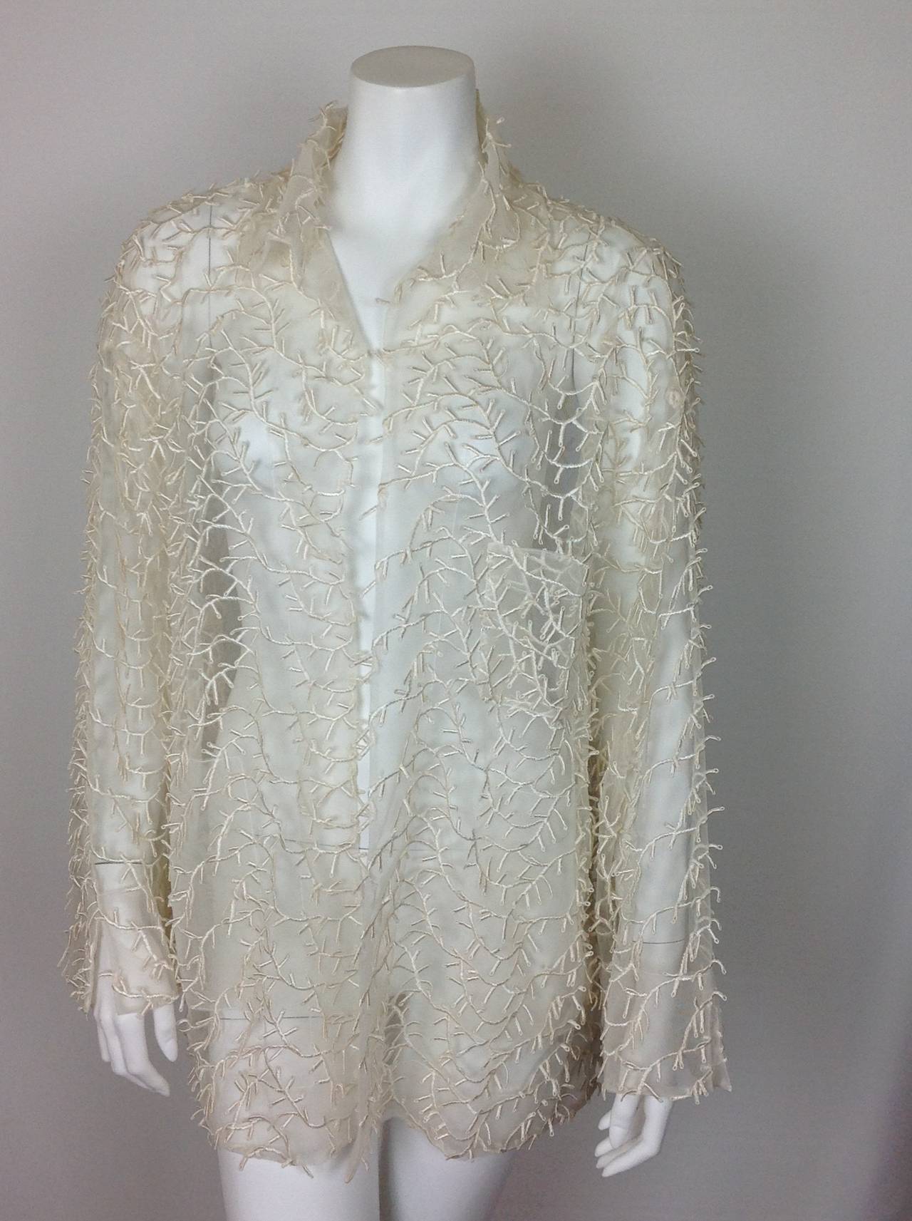 Mesh cream vine/eyelash jacket Miss V by Valentino.
Lightweight mesh embroidered with vines.The embroidered stylized 
