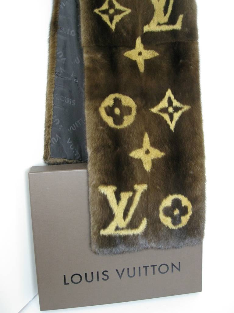 Limited Collection - Louis Vuitton 100% Vison Mink stole/scarf.  Dark brown mink printed with Iconic monogram. 
Double lined in silk.
Made in France. 
Comes with brown box and beautiful black felt dust bag.
Highly collectible.