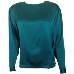 Chanel Teal silk charmuse blouse.