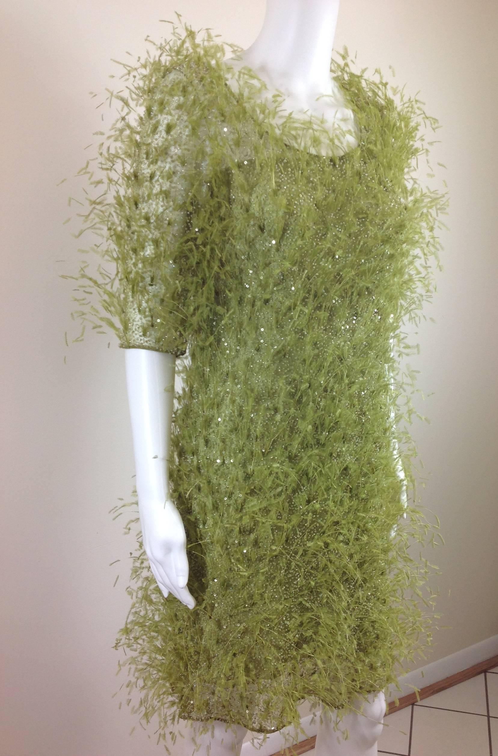 Chado Ralph Rucci 2 piece lime green party dress.  
Sheath style with lime green feathers, iridescent mini beads, lime green mini sequins sewn on stretch mesh-a true work of art.  
13.25