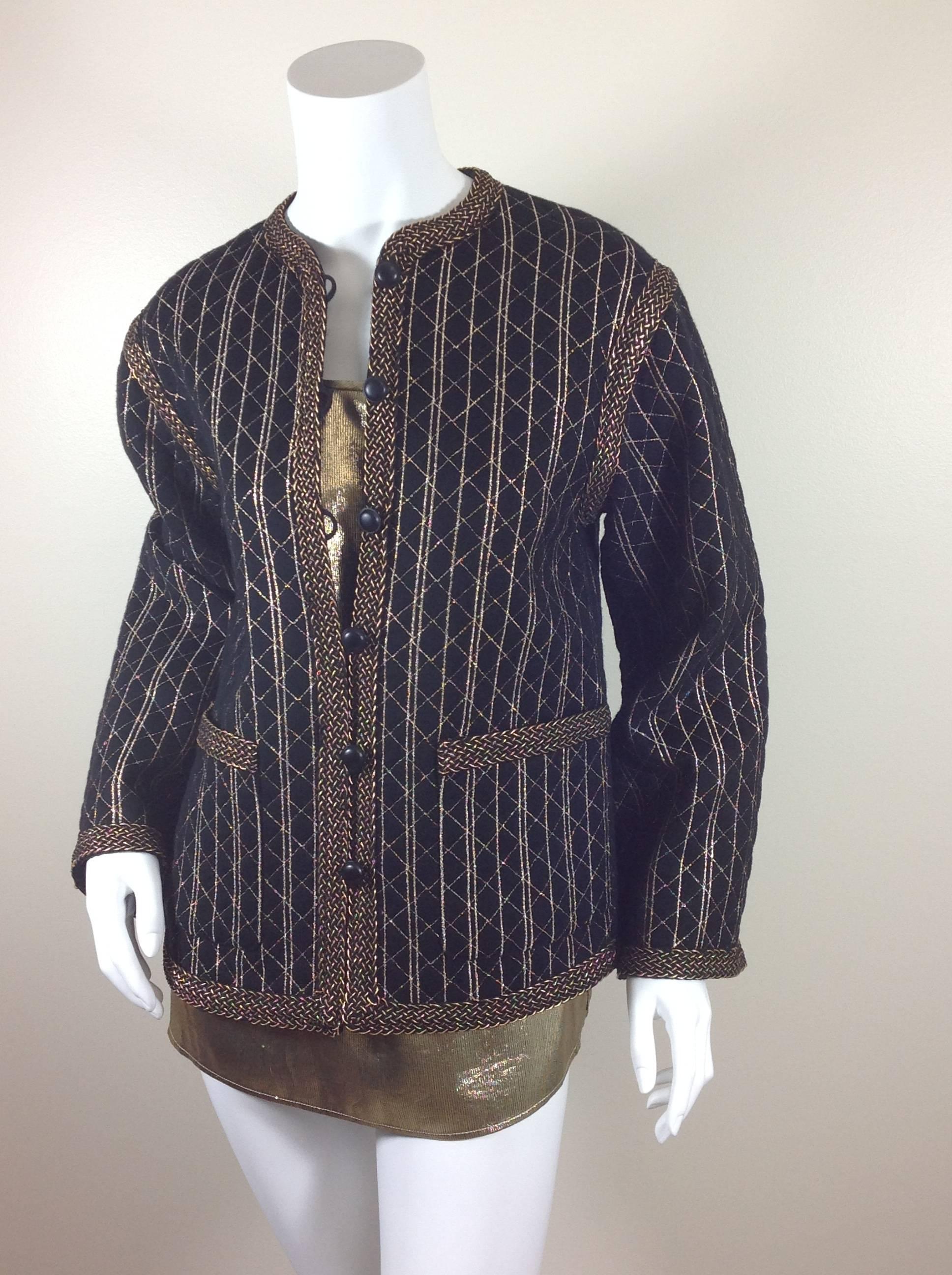 1970's Russian Collection jacket & blouse from Saint Laurent Rive Gauche.
The jacket is soft wool, embroidered with gold metallic thread, in diamonds and stripes.  The jewel neckline, front and bottom of the jacket, shoulders, cuffs and 2 pockets