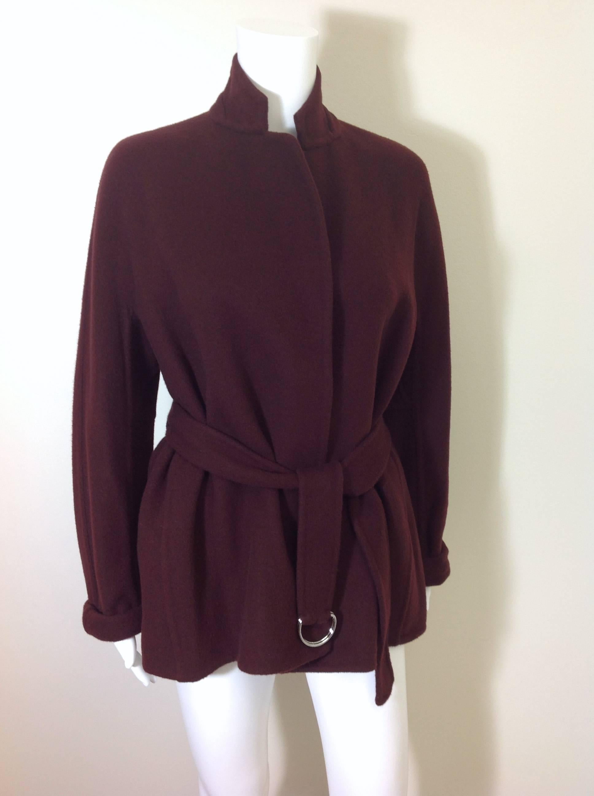 This Celine wrap jacket is perfect, worn as an alternative to a blazer, or as a lightweight piece of outerwear.  Doublefaced lightweight bordeaux cashmere is soft as a baby's tush.  Self belt (54