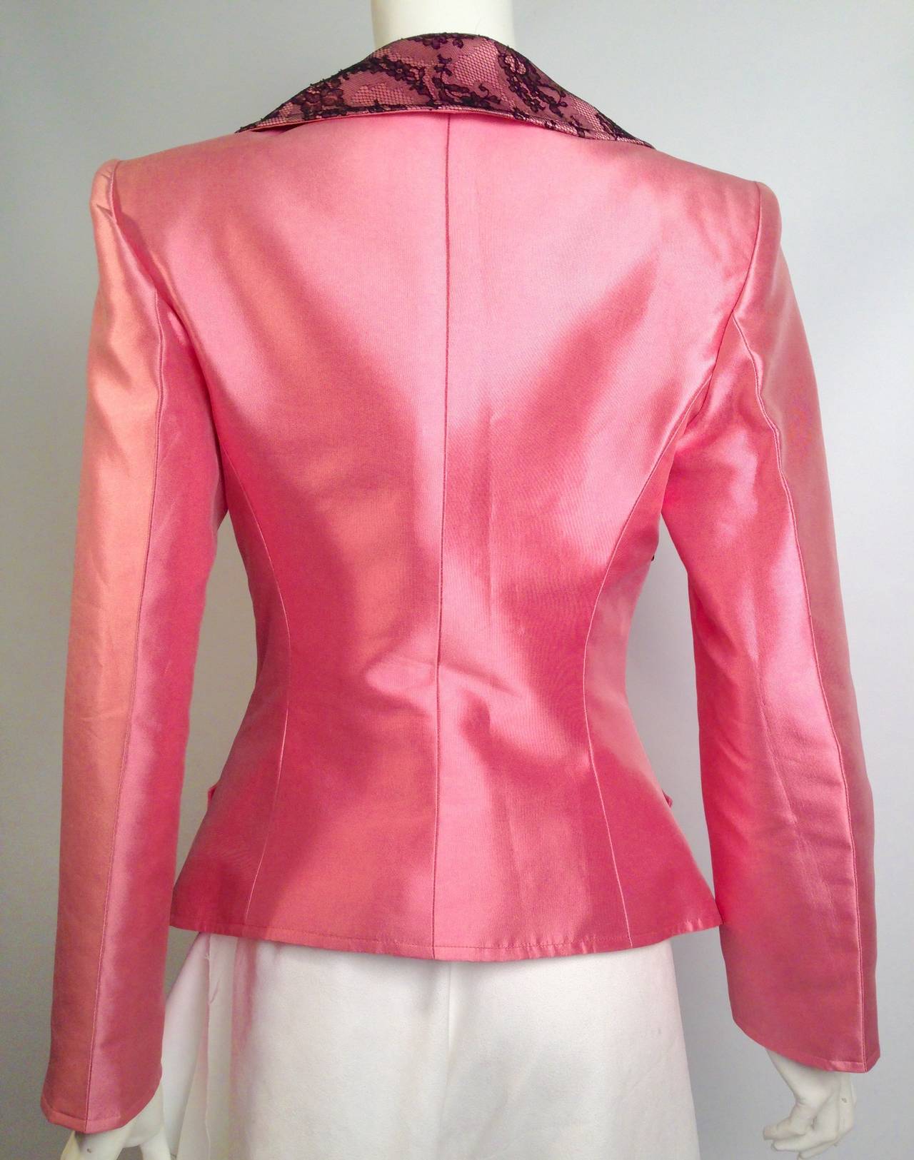 Indulge in the luxurious world of renowned haute couturier Christian Lacroix!  This stunning silk evening jacket is all the more tempting in a delightful shade of pink cotton candy.  Feminine and fitted jacket features asymmetric peaked lapel and
