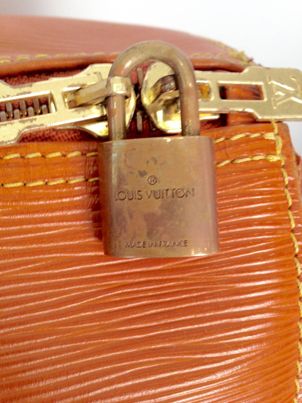 Louis Vuitton Keepall 55 in Cipango Gold Epi Cuir In Good Condition For Sale In Palm Beach, FL