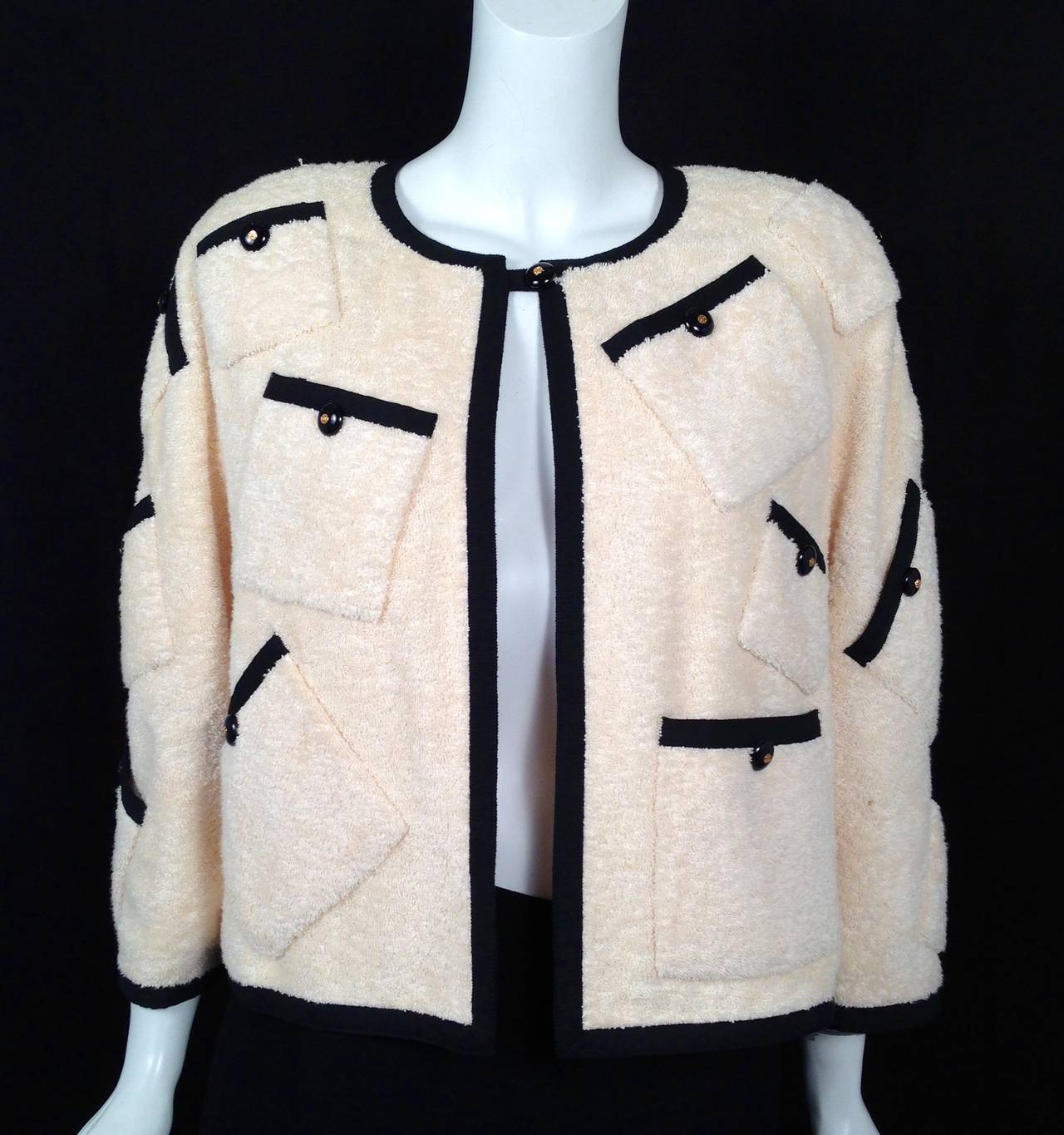 Karl Lagerfeld believes that Terry Cloth is meant for more than just bathrobes and towels!  This atypical Chanel jacket is highly desired by any serious collector.  Features ultra-luxurious Terry Cloth and a relaxed, cozy silhouette.  Don't worry,