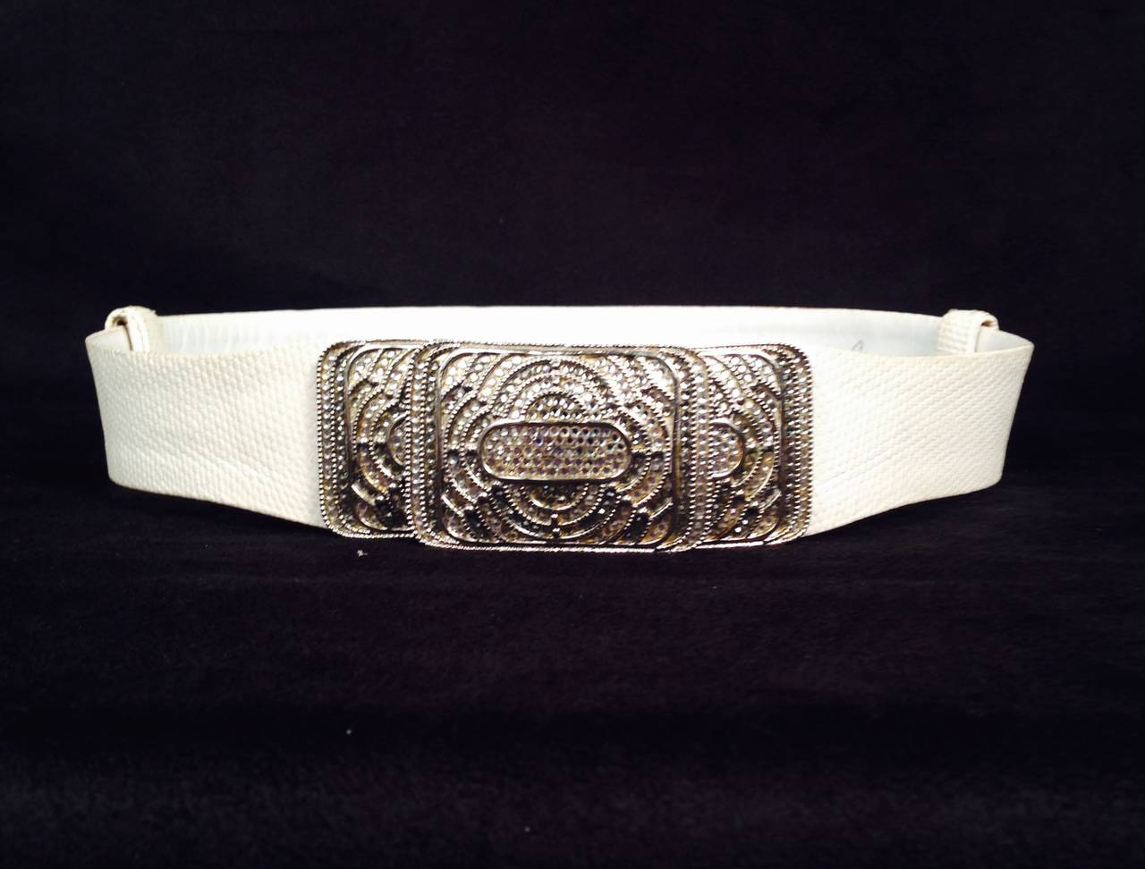 Vintage Ivory Lizard Belt With Deco Swarovkski Crystal Buckle proves that Judith Leiber was much more than the queen of minaudieres!  Features luxurious lizard and a crystal encrusted buckle reminiscent of Art Deco design.  Adjusts to waist maximum